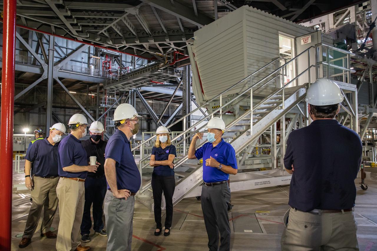 Kennedy Space Center Director Bob Cabana, second from right, speaks to Russell Vought, across from him, director of the White House Office of Management and Budget, during a tour of the Vehicle Assembly Building (VAB) on Aug. 28, 2020. Standing to the left of Vought is NASA Administrator Jim Bridenstine. Third from right is Kennedy Space Center Deputy Director Janet Petro. The VAB is critical to the assembly of the Space Launch System rocket for NASA’s Artemis program. The Office of Management and Budget is working with the U.S. Congress to line up the necessary resources to land the first woman and the next man on the Moon in 2024.