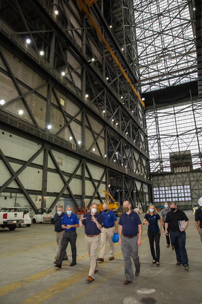NASA Administrator Jim Bridenstine, in the center, tours the Vehicle Assembly Building at NASA’s Kennedy Space Center in Florida on Aug. 28, 2020, with Russell Vought, in front at right, director of the White House Office of Management and Budget. Accompanying them is Kennedy Director Bob Cabana, second from left. Behind Vought is Kennedy Deputy Director Janet Petro. At right, next to Petro, is Brian McCormack, associate director of the White House Office of Management and Budget. The VAB is critical to the assembly of the Space Launch System rocket for NASA’s Artemis program. The Office of Management and Budget is working with the U.S. Congress to line up the necessary resources to land the first woman and the next man on the Moon in 2024.