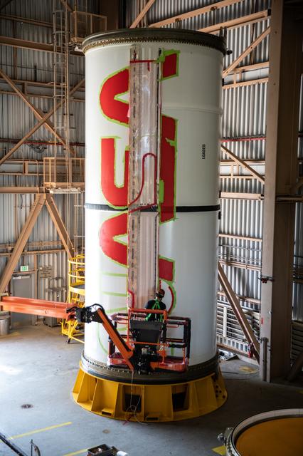 NASA image: Worm Logo Painting on SLS Booster Segments