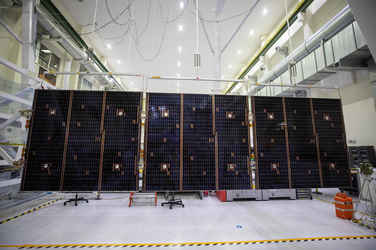 Inside the Neil Armstrong Operations and Checkout Building high bay at NASA’s Kennedy Space Center in Florida, in preparation for installation on the Artemis I spacecraft, technicians have extended one of the Artemis I solar array wings for inspection on Sept. 10, 2020, to confirm that it unfurled properly and all of the mechanisms functioned as expected. The solar array is one of four panels that will generate 11 kilowatts of power and span about 63 feet. The array is a component of Orion’s service module, which is provided by the European Space Agency and built by Airbus Defence and Space to supply Orion’s power, propulsion, air and water. The first in a series of increasingly complex missions, Artemis I will test the Orion spacecraft and Space Launch System as an integrated system ahead of crewed flights to the Moon. Under the Artemis program, NASA will land the first woman and the next man on the Moon in 2024.