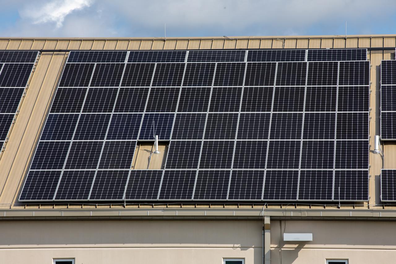 The Electrical Maintenance Facility (EMF) at NASA's Kennedy Space Center in Florida has solar panels capable of producing 125 kilowatts. Installation of the panels began in August 2019 and by February 2020, the panels were up and running, generating enough power to supply the facility. The addition of the solar panels has turned the EMF into a "net positive" facility, meaning it now produces more energy than it consumes.