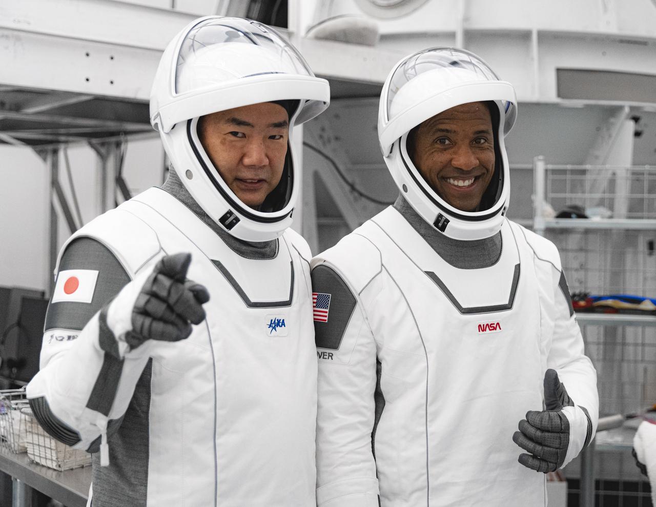 NASA’s SpaceX Crew-1 astronauts participate in crew equipment interface testing at SpaceX headquarters in Hawthorne, California, on Sept. 24, 2020. From left are mission specialist Soichi Noguchi, Japan Aerospace Exploration Agency (JAXA) astronaut, and Crew-1 pilot Victor Glover. The other Crew-1 astronauts also training, but not pictured, are mission specialist Shannon Walker, and Crew Dragon commander Michael Hopkins, all NASA astronauts. NASA’s SpaceX Crew-1 mission is the first crew rotational flight of a U.S. commercial spacecraft with astronauts to the International Space Station. The Crew-1 mission will launch from Launch Complex 39A at Kennedy Space Center in Florida. Crew-1 is part of NASA's Commercial Crew Program, which has returned human spaceflight capabilities to the U.S.