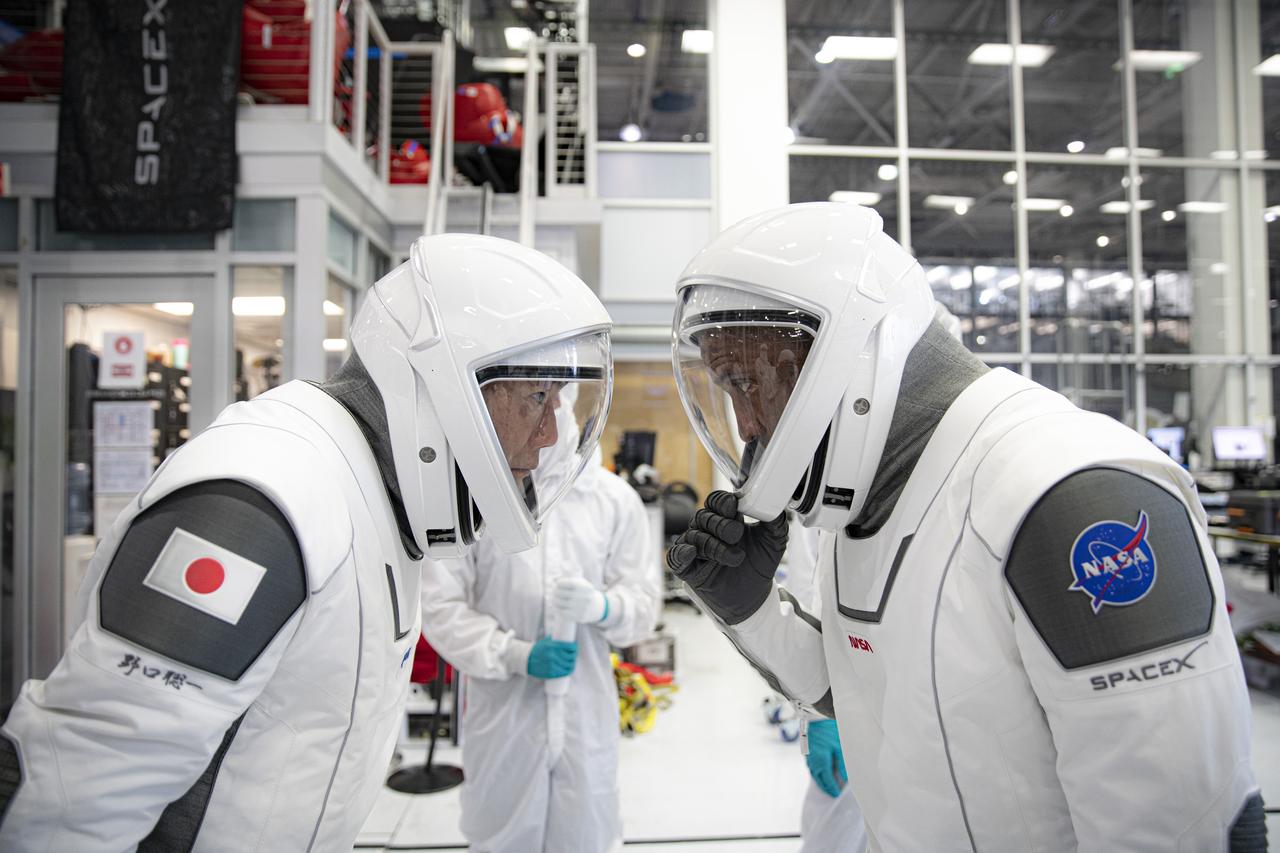 NASA’s SpaceX Crew-1 astronauts participate in crew equipment interface testing at SpaceX headquarters in Hawthorne, California, on Sept. 24, 2020. From left are mission specialist Soichi Noguchi, Japan Aerospace Exploration Agency (JAXA) astronaut, and pilot Victor Glover, NASA astronaut. The other crew members training, but not pictured, are mission specialist Shannon Walker, and Crew Dragon commander Michael Hopkins, both NASA astronauts. NASA’s SpaceX Crew-1 mission is the first crew rotational flight of a U.S. commercial spacecraft with astronauts to the International Space Station. The Crew-1 mission will launch from Launch Complex 39A at Kennedy Space Center in Florida. Crew-1 is part of NASA's Commercial Crew Program, which has returned human spaceflight capabilities to the U.S.