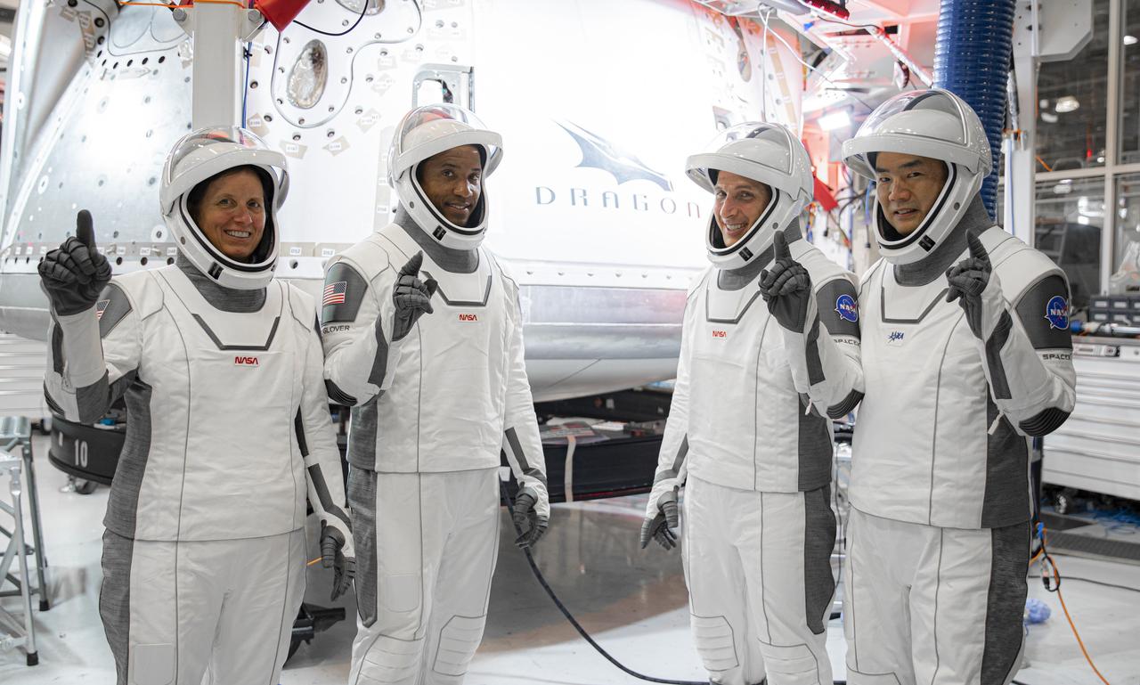 NASA’s SpaceX Crew-1 astronauts participate in crew equipment interface testing at SpaceX headquarters in Hawthorne, California, on Sept. 24, 2020. From left are mission specialist Shannon Walker, pilot Victor Glover, and Crew Dragon commander Michael Hopkins, all NASA astronauts, and mission specialist Soichi Noguchi, Japan Aerospace Exploration Agency (JAXA) astronaut. NASA’s SpaceX Crew-1 mission is the first crew rotational flight of a U.S. commercial spacecraft with astronauts to the International Space Station. The Crew-1 mission will launch from Launch Complex 39A at Kennedy Space Center in Florida. Crew-1 is part of NASA's Commercial Crew Program, which has returned human spaceflight capabilities to the U.S.