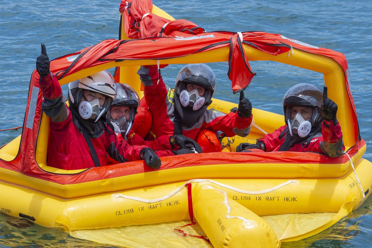 NASA’s SpaceX Crew-1 astronauts participate in an emergency water egress exercise in the Atlantic Ocean off the coast of Florida on Sept. 24, 2020. From left are mission specialist Soichi Noguchi, mission specialist Shannon Walker, Crew Dragon commander Michael Hopkins, and pilot Victor Glover. Soichi is a Japan Aerospace Exploration Agency astronaut; the others are NASA astronauts.  NASA’s SpaceX Crew-1 mission is the first crew rotational flight of a U.S. commercial spacecraft with astronauts to the International Space Station. The Crew-1 mission will launch from Launch Complex 39A at Kennedy Space Center in Florida. Crew-1 is part of NASA's Commercial Crew Program, which has returned human spaceflight capabilities to the U.S.