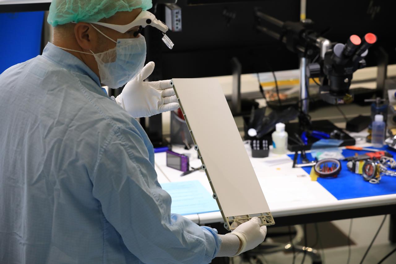Engineers and technicians at NASA’s Kennedy Space Center in Florida prepare to install the radiator for the Mass Spectrometer Observing Lunar Operations (MSolo) instrument inside the Space Station Processing Facility on Sept. 25, 2020. MSolo will help analyze the chemical makeup of landing sites on the Moon, as well as study water on the lunar surface. The radiator will help keep the instrument’s temperature stable in the extreme heat and cold it will encounter. MSolo instruments are scheduled to launch on multiple robotic missions as part of NASA’s Commercial Lunar Payload Services (CLPS), with the first of these missions exploring Lacus Mortis, a large crater on the near side of the Moon, beginning in 2021. MSolo also will be one of three instruments on the agency’s water-hunting Volatiles Investigating Polar Exploration Rover, VIPER, scheduled to launch to the Moon’s South Pole in late 2023.
