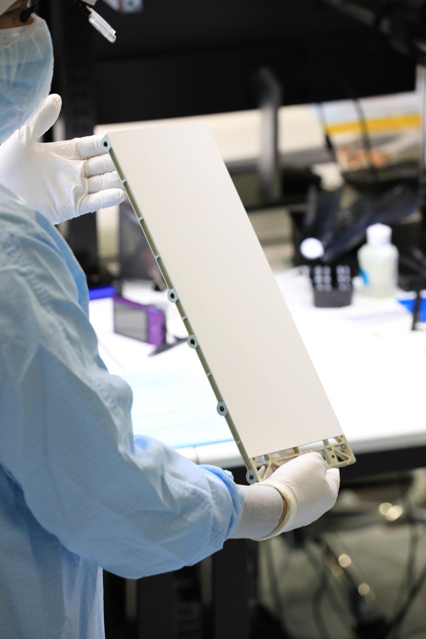 Engineers and technicians at NASA’s Kennedy Space Center in Florida prepare to install the radiator for the Mass Spectrometer Observing Lunar Operations (MSolo) instrument inside the Space Station Processing Facility on Sept. 25, 2020. MSolo will help analyze the chemical makeup of landing sites on the Moon, as well as study water on the lunar surface. The radiator will help keep the instrument’s temperature stable in the extreme heat and cold it will encounter. MSolo instruments are scheduled to launch on multiple robotic missions as part of NASA’s Commercial Lunar Payload Services (CLPS), with the first of these missions exploring Lacus Mortis, a large crater on the near side of the Moon, beginning in 2021. MSolo also will be one of three instruments on the agency’s water-hunting Volatiles Investigating Polar Exploration Rover, VIPER, scheduled to launch to the Moon’s South Pole in late 2023.