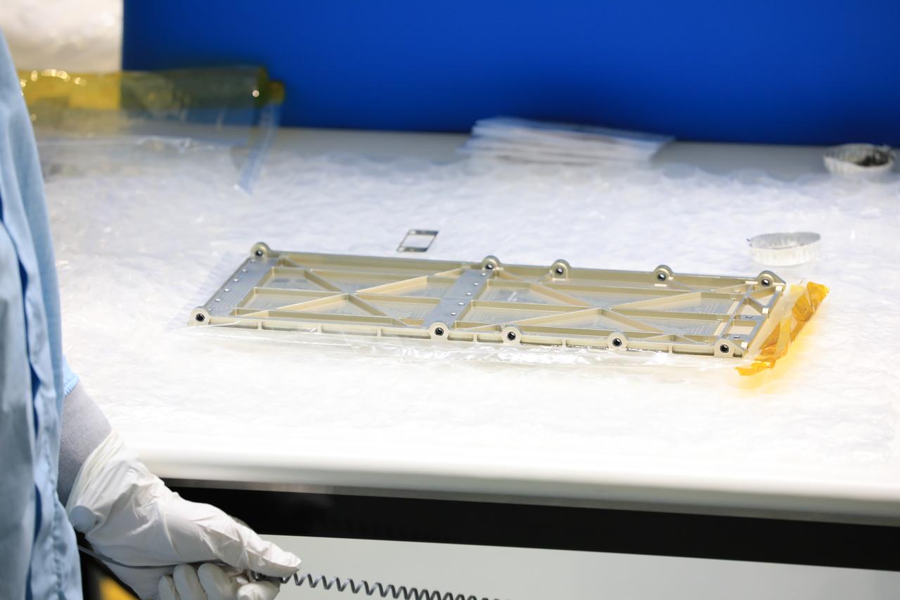 Engineers and technicians at NASA’s Kennedy Space Center in Florida have prepped the Mass Spectrometer Observing Lunar Operations (MSolo) instrument’s radiator for installation inside the Space Station Processing Facility on Sept. 25, 2020. MSolo will help analyze the chemical makeup of landing sites on the Moon, as well as study water on the lunar surface. The radiator will help keep the instrument’s temperature stable in the extreme heat and cold it will encounter. MSolo instruments are scheduled to launch on multiple robotic missions as part of NASA’s Commercial Lunar Payload Services (CLPS), with the first of these missions exploring Lacus Mortis, a large crater on the near side of the Moon, beginning in 2021. MSolo also will be one of three instruments on the agency’s water-hunting Volatiles Investigating Polar Exploration Rover, VIPER, scheduled to launch to the Moon’s South Pole in late 2023.