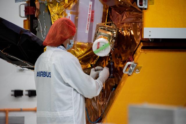 NASA image: Sentinel-6 Spacecraft Removal from Container, Lift to MPT