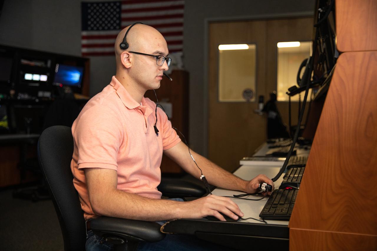 Inside the Launch Control Center at Kennedy Space Center on Sept. 29, 2020, engineer Danny Zaatari, with Exploration Ground Systems, works on software for the launch of Artemis I. Engineers at the Florida spaceport are staying focused on the “Path to the Pad.” Artemis I is the first in a series of increasingly complex missions that will enable human exploration to the Moon and Mars.
