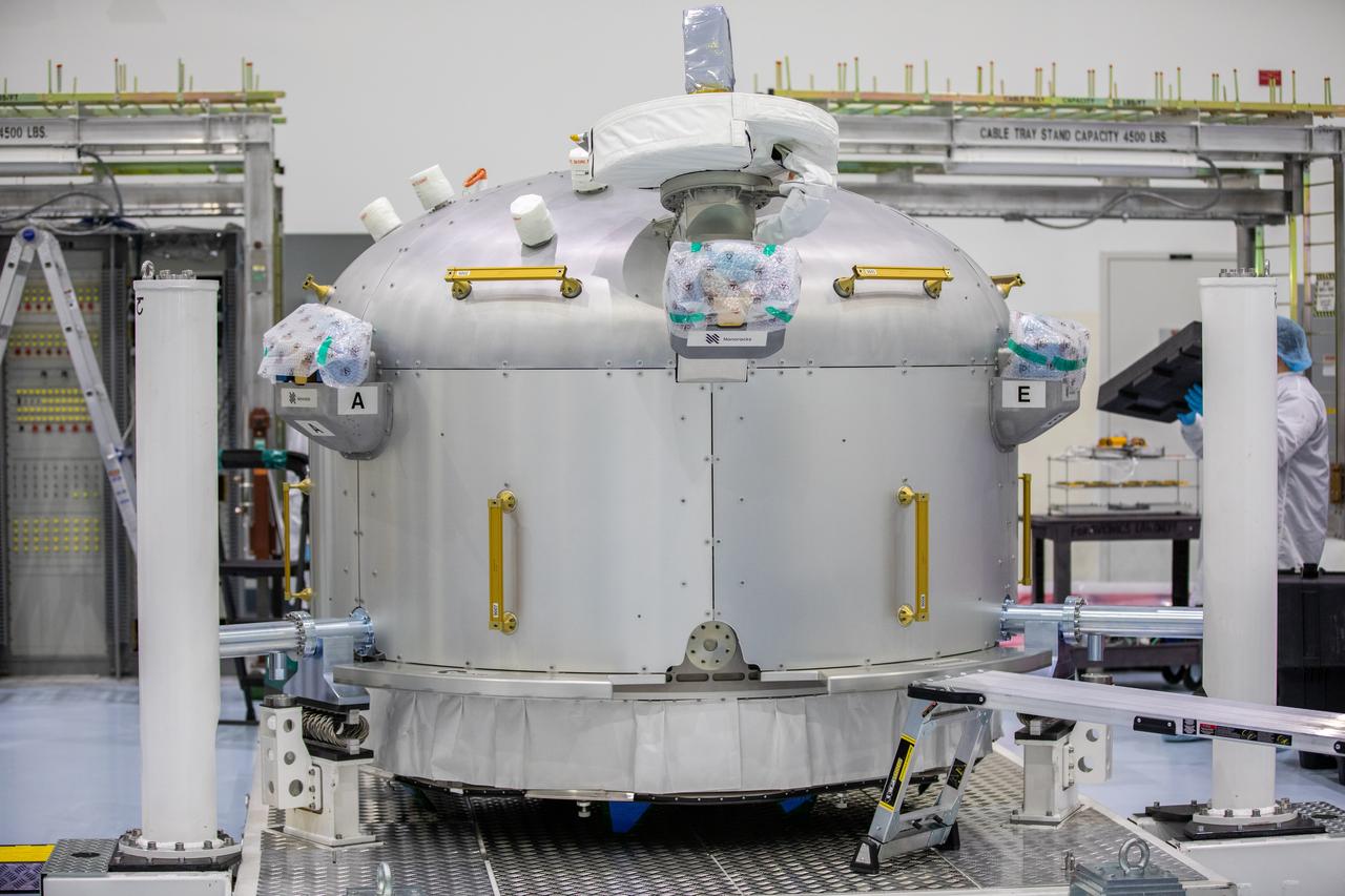 The Nanoracks Bishop Airlock is in view inside the Space Station Processing Facility at NASA's Kennedy Space Center in Florida on Sept. 29, 2020. The next-generation Nanoracks payload facility is being prepared for its flight to the International Space Station on SpaceX’s 21st commercial resupply services mission (CRS-21) to the International Space Station. The Bishop Airlock is the first commercially funded airlock for the space station. It will provide payload hosting, robotics testing, satellite deployment, serve as an outside toolbox for station crew spacewalks, and more. CRS-21 is scheduled to launch on a SpaceX Falcon 9 rocket no earlier than November from Launch Complex 39A at Kennedy Space Center.