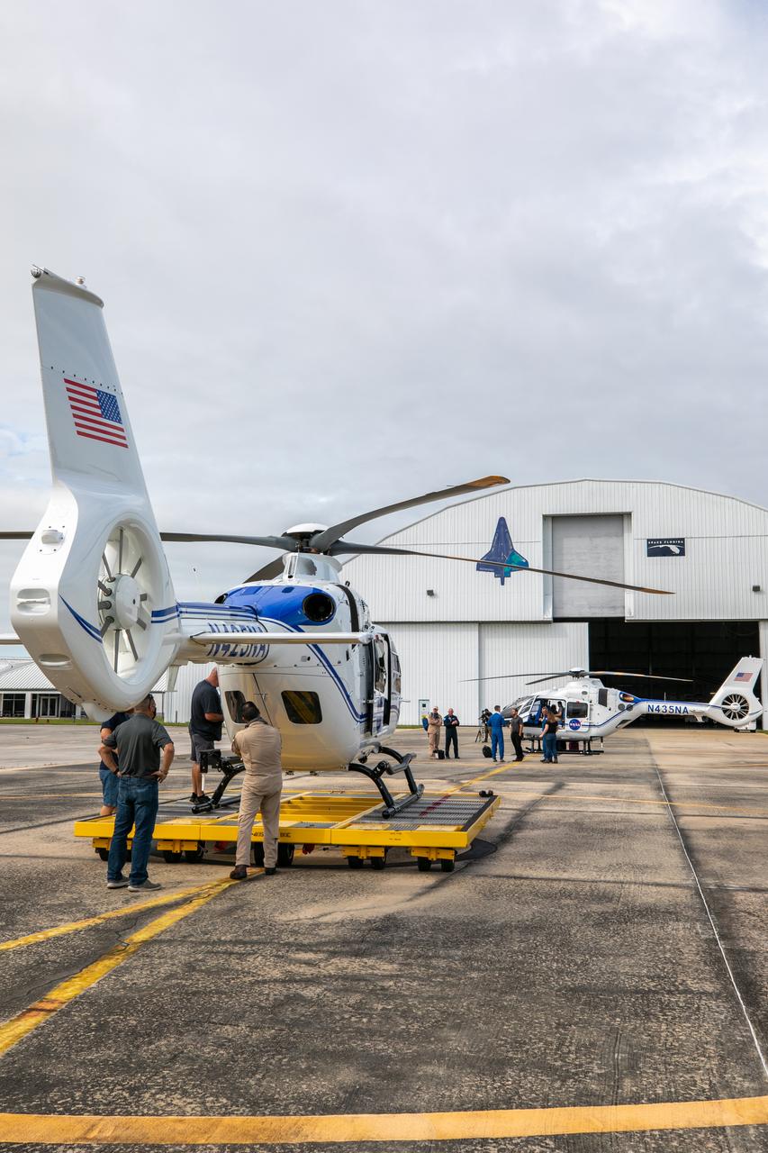 Two new Airbus H135 (T3) helicopters arrive at the Launch and Landing Facility runway at NASA’s Kennedy Space Center in Florida on Sept. 30, 2020. The H135 helicopters will replace the Bell Huey 2 security aircraft in service now, maintained by Kennedy’s Flight Operations team. These new helicopters provide a number of technological and safety advantages over the Hueys, such as more lifting power, greater stability in the air, and expanded medical capabilities. The team expects to fully transition to flying the two H135s later this year. A third is expected to arrive in early 2021, and with its arrival, will complete the fleet’s upgrade.