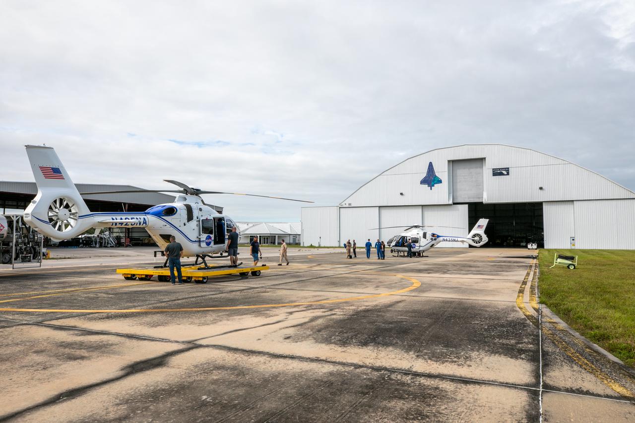 Two new Airbus H135 (T3) helicopters arrive at the Launch and Landing Facility runway at NASA’s Kennedy Space Center in Florida on Sept. 30, 2020. The H135 helicopters will replace the Bell Huey 2 security aircraft in service now, maintained by Kennedy’s Flight Operations team. These new helicopters provide a number of technological and safety advantages over the Hueys, such as more lifting power, greater stability in the air, and expanded medical capabilities. The team expects to fully transition to flying the two H135s later this year. A third is expected to arrive in early 2021, and with its arrival, will complete the fleet’s upgrade.