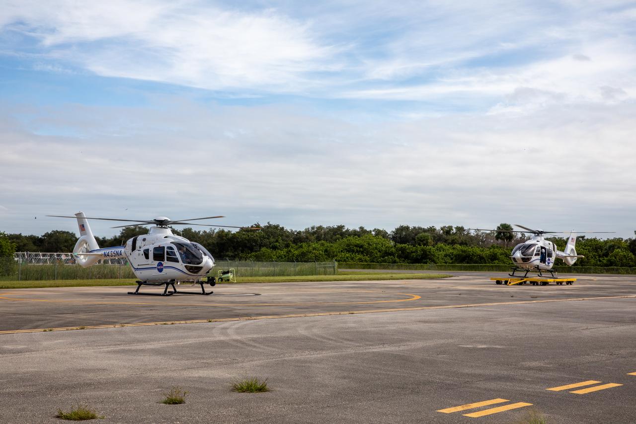 Two new Airbus H135 (T3) helicopters arrive at the Launch and Landing Facility runway at NASA’s Kennedy Space Center in Florida on Sept. 30, 2020. The H135 helicopters will replace the Bell Huey 2 security aircraft in service now, maintained by Kennedy’s Flight Operations team. These new helicopters provide a number of technological and safety advantages over the Hueys, such as more lifting power, greater stability in the air, and expanded medical capabilities. The team expects to fully transition to flying the two H135s later this year. A third is expected to arrive in early 2021, and with its arrival, will complete the fleet’s upgrade.