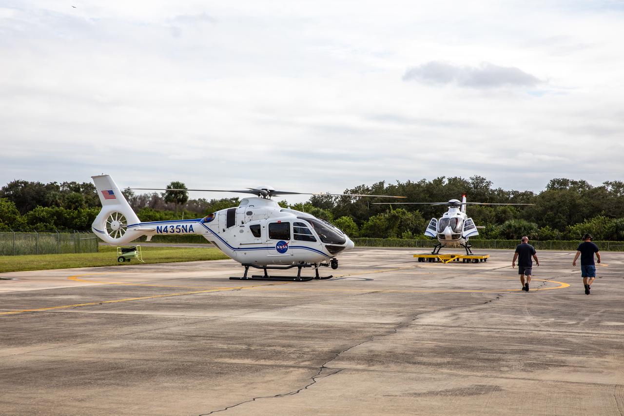 Two new Airbus H135 (T3) helicopters arrive at the Launch and Landing Facility runway at NASA’s Kennedy Space Center in Florida on Sept. 30, 2020. The H135 helicopters will replace the Bell Huey 2 security aircraft in service now, maintained by Kennedy’s Flight Operations team. These new helicopters provide a number of technological and safety advantages over the Hueys, such as more lifting power, greater stability in the air, and expanded medical capabilities. The team expects to fully transition to flying the two H135s later this year. A third is expected to arrive in early 2021, and with its arrival, will complete the fleet’s upgrade.
