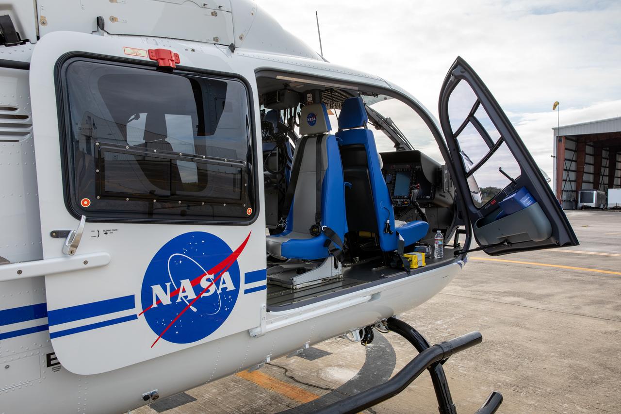 The interior of a new Airbus H135 (T3) helicopter is displayed after arriving at the Launch and Landing Facility runway at NASA’s Kennedy Space Center in Florida on Sept. 30, 2020. A second H135 helicopter also was delivered on Sept. 30, and a third is expected to arrive in early 2021. The three H135 helicopters will replace the Bell Huey 2 security aircraft in service now, maintained by Kennedy’s Flight Operations team. These new helicopters provide a number of technological and safety advantages over the Hueys, such as more lifting power, greater stability in the air, and expanded medical capabilities. The team expects to fully transition to flying the two H135s later this year, and once the third arrives, the fleet’s upgrade will be complete.