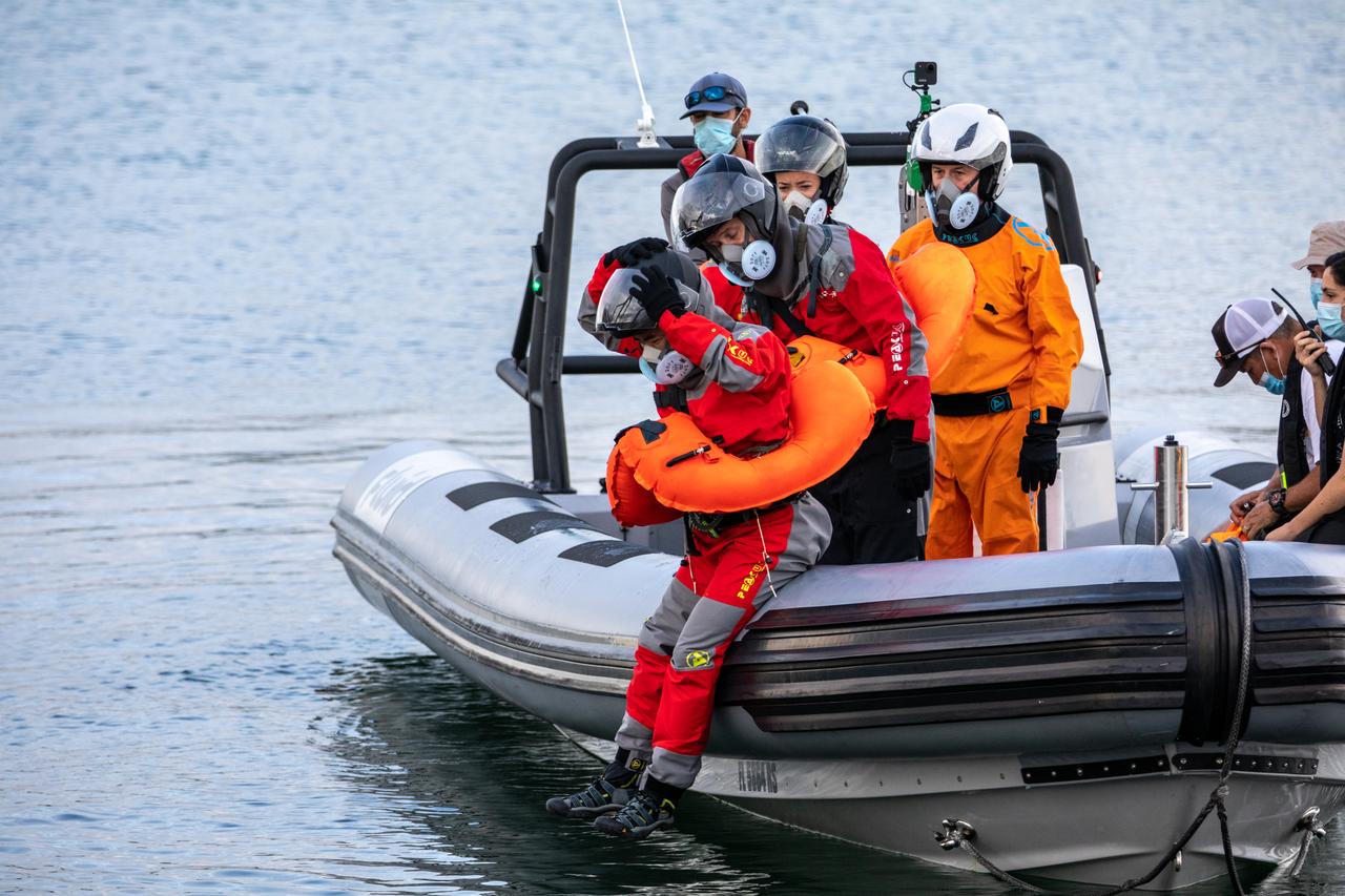 NASA astronauts Shane Kimbrough and Megan McArthur, Japan Aerospace Exploration Agency astronaut Akihiko Hoshide, and European Space Agency astronaut Thomas Pesquet participate in an egress training exercise in Port Canaveral, Florida, on Oct. 1, 2020, in preparation for NASA’s SpaceX Crew-2 mission as part of the agency’s Commercial Crew Program. The exercise involved simulating an emergency situation after splashdown of the Crew Dragon spacecraft. Using a mock-up of the Crew Dragon, the crew practiced exiting the capsule and jumping into the water. Crew-2 is targeted to launch from Kennedy Space Center’s Launch Complex 39A in spring 2021.