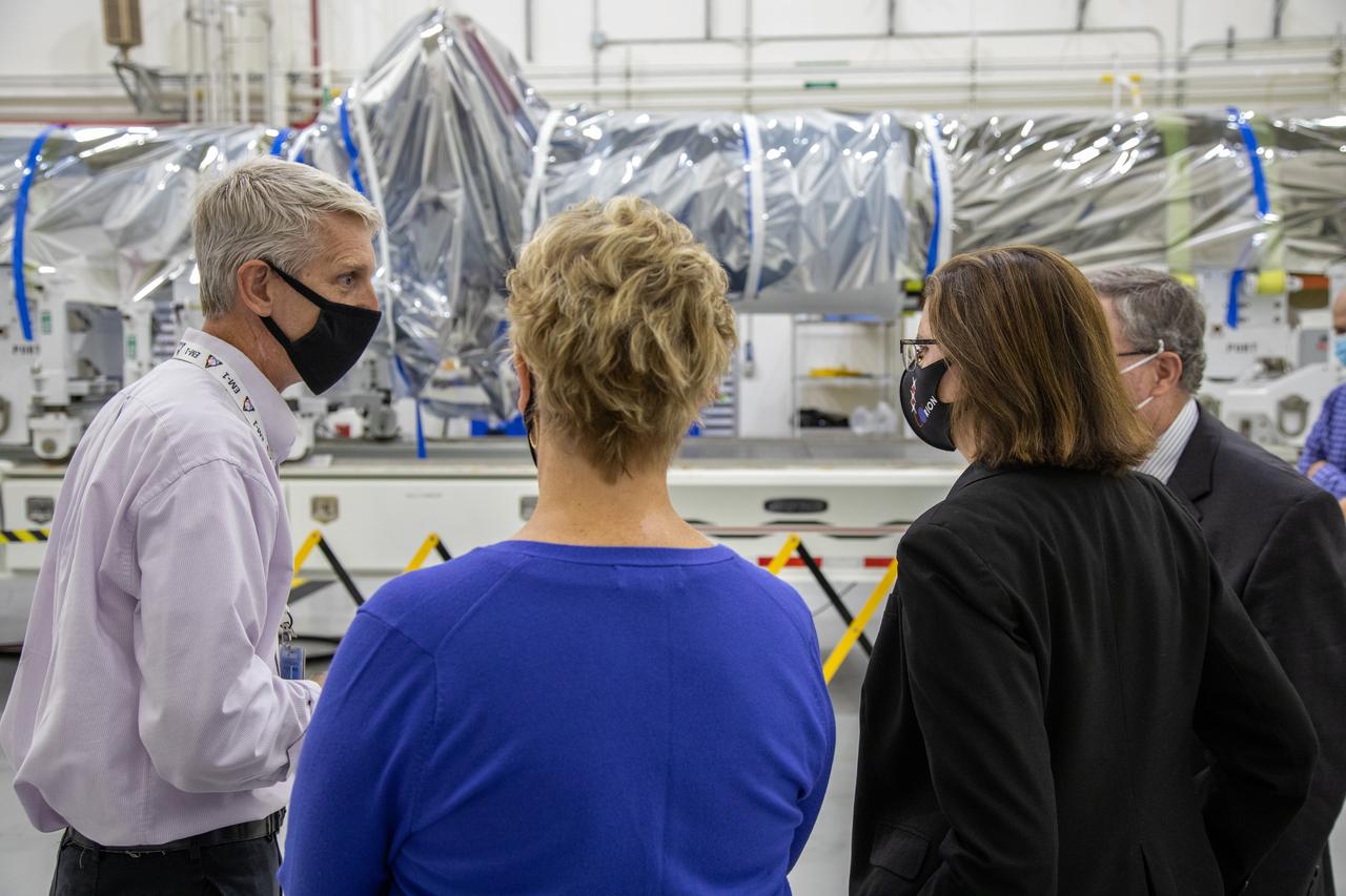 Catherine Koerner, second from right, NASA Orion Program manager, along with senior managers from Orion and Lockheed Martin, tour the Launch Abort System Facility at NASA’s Kennedy Space Center in Florida on Oct. 6, 2020. Accompanying her from left, are Scott Wilson, NASA Kennedy Orion Production Operations manager; Annette Hasbrook, Orion Program assistant manager; and Mike Hawes, Lockheed Martin vice president and Orion Program manager. They are viewing the launch abort system for the Artemis II mission. Koerner also viewed the Orion spacecraft for the Artemis I and II missions in the Neil Armstrong Operations and Checkout Building. The first in a series of increasingly complex missions, Artemis I will test the Orion spacecraft and Space Launch System as an integrated system ahead of crewed flights to the Moon. Under the Artemis program, NASA will land the first woman and the next man on the Moon in 2024.