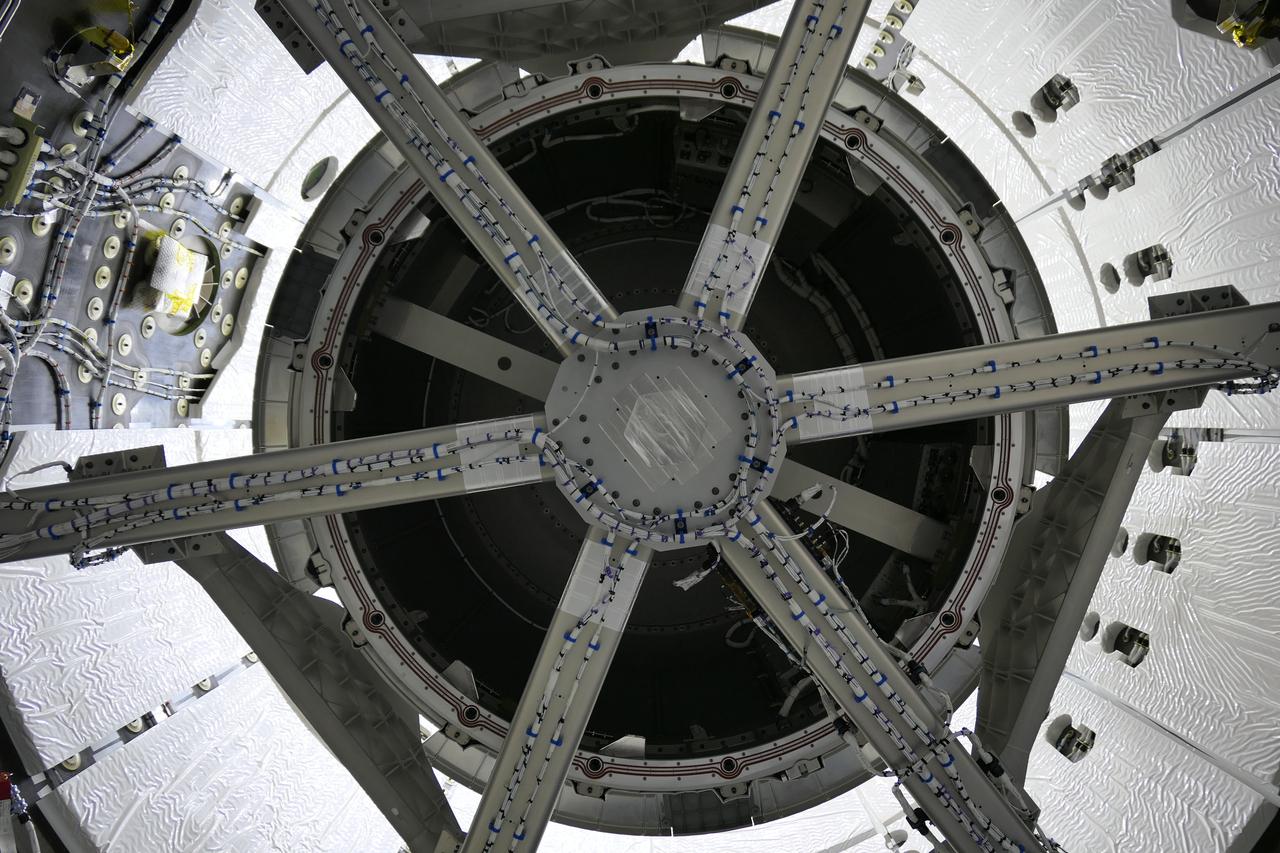 The Nanoracks Bishop Airlock is packed in the Dragon spacecraft’s trunk on Oct. 12, 2020, inside SpaceX’s processing facility at NASA’s Kennedy Space Center in Florida for its ride to the International Space Station aboard the company’s 21st Commercial Resupply Services (CRS-21) mission. The first commercially funded airlock for the orbiting laboratory, it will provide payload hosting, robotics testing, satellite deployment, serve as an outside toolbox for station crew spacewalks, and more. CRS-21 is scheduled to launch on a SpaceX Falcon 9 from Kennedy’s Launch Complex 39A.
