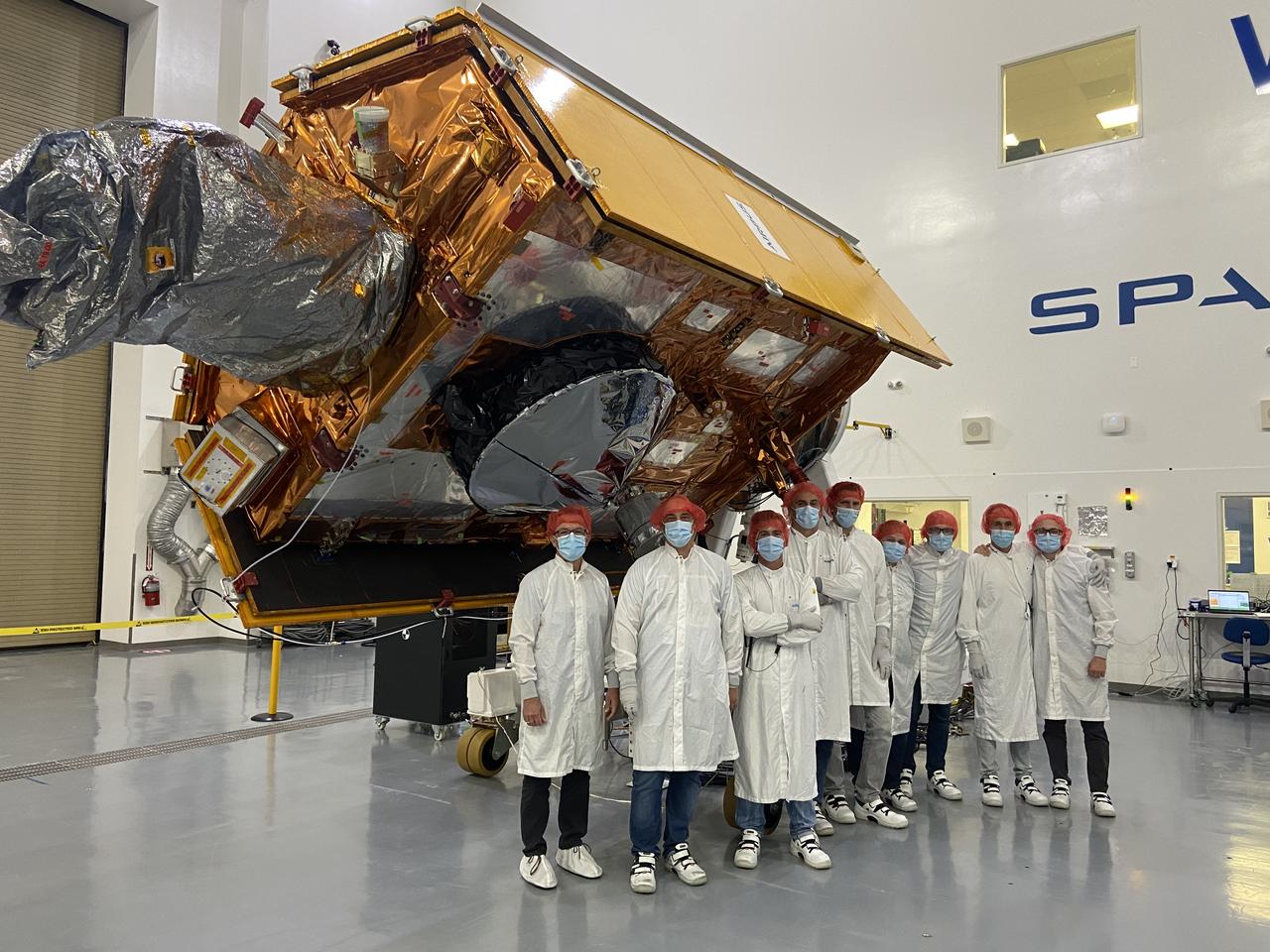 Sentinel-6 Michael Freilich team members from European Space Agency pose with the spacecraft during processing. Launch is scheduled for Nov. 10, 2020 from Vandenberg Air Force Base in California. NASA’s Launch Services Program based at Kennedy Space Center is responsible for launch management.