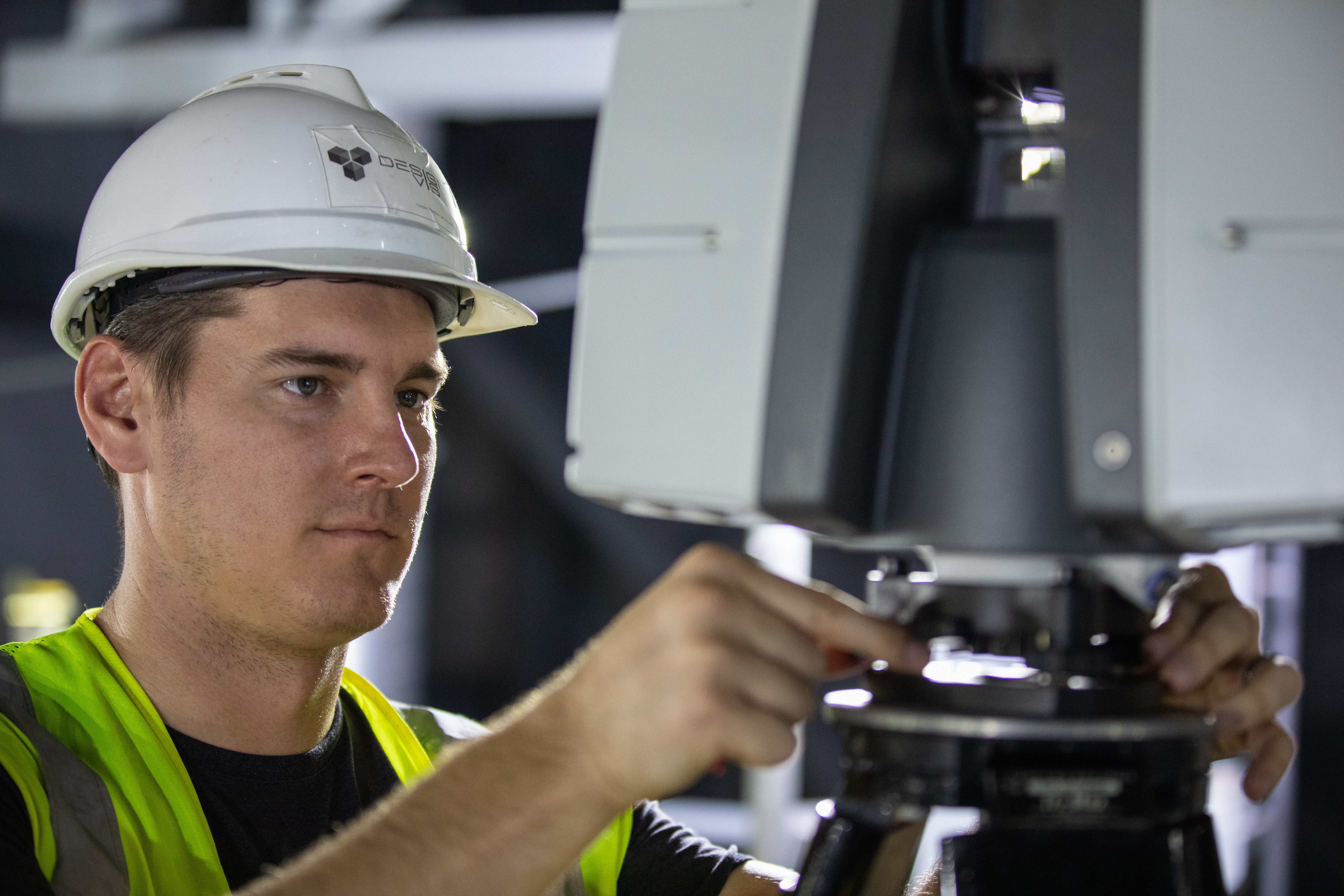 An engineer adjusts equipment from the Design Visualization Lab set up inside High Bay 3 of the Vehicle Assembly Building at NASA’s Kennedy Space Center on Oct. 14, 2020. The equipment will be used to do 3-D modeling of the mobile launcher that will carry the Space Launch System and Orion spacecraft to Launch Complex 39B for the Artemis I mission. Artemis I will test the Orion spacecraft and SLS as an integrated system ahead of crewed flights to the Moon. Under the Artemis program, NASA will land the first woman and the next man on the Moon in 2024.