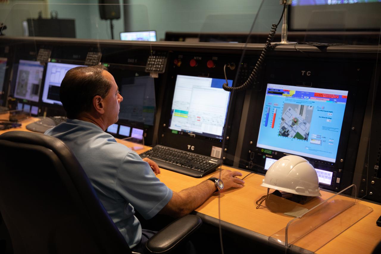 An engineer reviews test data inside a control room at the Launch Equipment Test Facility (LETF) on Oct. 19, 2020, at NASA’s Kennedy Space Center in Florida. The LETF is a unique set of structures, equipment and tools built to test full-scale umbilicals and release mechanisms for the space shuttle. The facility also was used to test the umbilicals and other mechanisms for the mobile launcher. The mobile launcher will carry the Space Launch System and Orion spacecraft to Launch Pad 39B for Artemis I, a mission that will test the rocket and spacecraft as an integrated system ahead of crewed flights to the Moon. NASA will land the first woman and the next man on the Moon in 2024.
