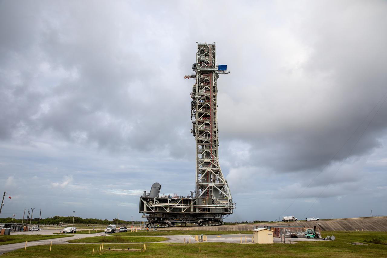 During the morning on Oct. 20, 2020, the mobile launcher for the Artemis I mission, atop crawler-transporter 2, moves up the ramp leading to Launch Pad 39B at NASA’s Kennedy Space Center in Florida. The nearly 400-foot-tall mobile launcher will remain at the pad for two weeks, while engineers with Exploration Ground Systems and Jacobs will perform several tasks, including a timing test to validate the launch team’s countdown timeline, and a thorough, top-to-bottom wash down of the mobile launcher to remove any debris remaining from construction and installation of the umbilical arms. Artemis I will test the Orion spacecraft and Space Launch System as an integrated system ahead of crewed flights to the Moon. Under the Artemis program, NASA will land the first woman and the next man on the Moon in 2024.