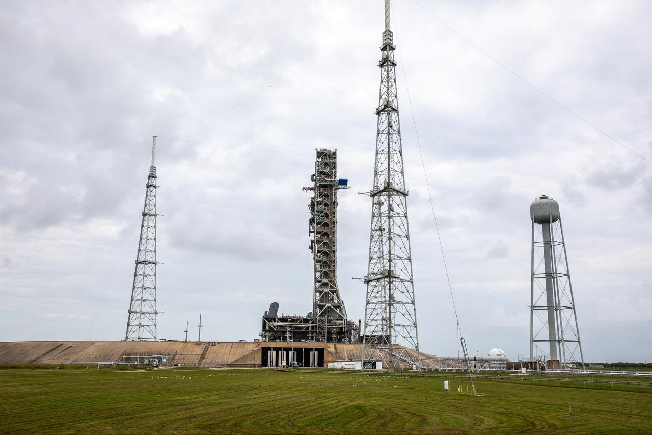 During the morning on Oct. 20, 2020, the mobile launcher for the Artemis I mission, atop crawler-transporter 2, arrives at the top of Launch Pad 39B at NASA’s Kennedy Space Center in Florida. The nearly 400-foot-tall mobile launcher will remain at the pad for two weeks, while engineers with Exploration Ground Systems and Jacobs will perform several tasks, including a timing test to validate the launch team’s countdown timeline, and a thorough, top-to-bottom wash down of the mobile launcher to remove any debris remaining from construction and installation of the umbilical arms. Artemis I will test the Orion spacecraft and Space Launch System as an integrated system ahead of crewed flights to the Moon. Under the Artemis program, NASA will land the first woman and the next man on the Moon in 2024.