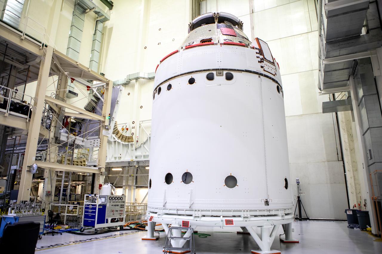 The spacecraft adapter jettison fairing panels are secured onto Orion’s European Service Module (ESM) on Oct. 27, 2020, inside the Neil Armstrong Operations and Checkout Building (O&C) at NASA’s Kennedy Space Center in Florida. The three panels were inspected and moved into place for installation by technicians with Lockheed Martin. Recently, teams from across the globe installed the four solar array wings, which are housed inside the protective covering of the fairings. The fairing panels will encapsulate the ESM to protect it from harsh environments such as heat, wind, and acoustics as the spacecraft is propelled out of Earth’s atmosphere atop the Space Launch System rocket during NASA’s Artemis I mission.
