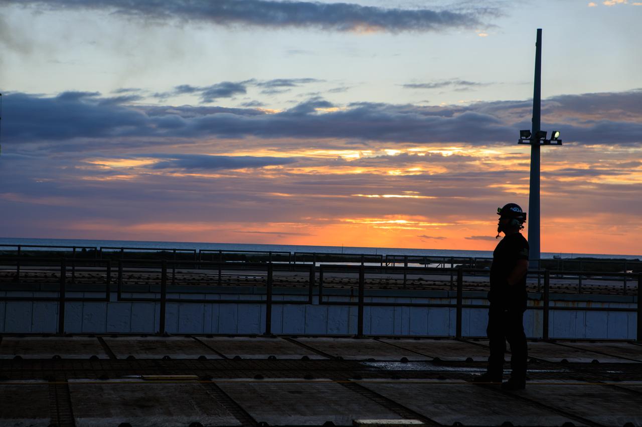 During sunrise on Oct. 30, 2020, preparations are underway for the mobile launcher for the Artemis I mission, atop crawler-transporter 2, to depart Launch Pad 39B and return to the Vehicle Assembly Building at NASA’s Kennedy Space Center in Florida. The nearly 400-foot-tall mobile launcher was at the pad for 10 days, while engineers with Exploration Ground Systems and Jacobs performed several tasks, including a timing test to validate the launch team’s countdown timeline, and a thorough, top-to-bottom wash down of the mobile launcher to remove any debris remaining from construction and installation of the umbilical arms. Artemis I will test the Orion spacecraft and Space Launch System as an integrated system ahead of crewed flights to the Moon. Under the Artemis program, NASA will land the first woman and the next man on the Moon in 2024.