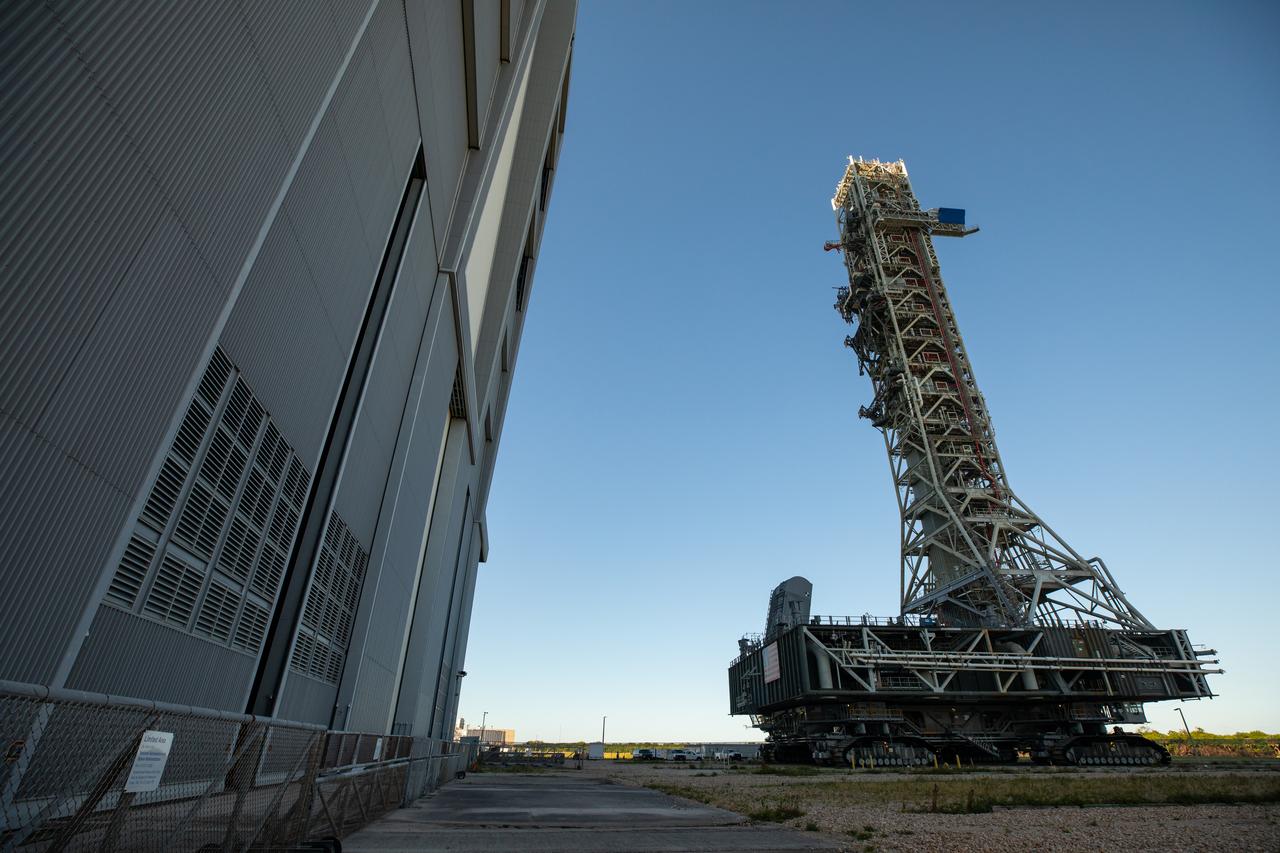 The mobile launcher for the Artemis I mission, atop crawler-transporter 2, arrives at the Vehicle Assembly Building at NASA’s Kennedy Space Center in Florida on Oct. 30, 2020. The nearly 400-foot-tall mobile launcher was at Launch Pad 39B for 10 days, while engineers with Exploration Ground Systems and Jacobs performed several tasks, including a timing test to validate the launch team’s countdown timeline, and a thorough, top-to-bottom wash down of the mobile launcher to remove any debris remaining from construction and installation of the umbilical arms. Artemis I will test the Orion spacecraft and Space Launch System as an integrated system ahead of crewed flights to the Moon. Under the Artemis program, NASA will land the first woman and the next man on the Moon in 2024.