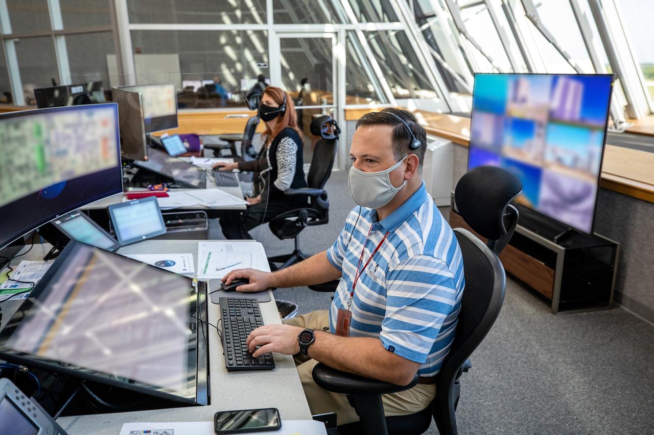 Charlie Blackwell-Thompson, at left, NASA Artemis launch director; and Wes Mosedale, technical assistant to the launch director, monitor a cryogenic propellant loading simulation inside Firing Room 1 in the Launch Control Center on Nov. 2, 2020, at NASA’s Kennedy Space Center in Florida. A team of engineers with Exploration Ground Systems and Jacobs, members of the cryogenics launch team, are rehearsing the steps to load the super-cooled liquid hydrogen and liquid oxygen into the Space Launch System’s (SLS) core and second stages to prepare for Artemis I. The first in a series of increasingly complex missions, Artemis I will test the Orion spacecraft and Space Launch System as an integrated system ahead of crewed flights to the Moon. NASA will land the first woman and the next man on the Moon in 2024.