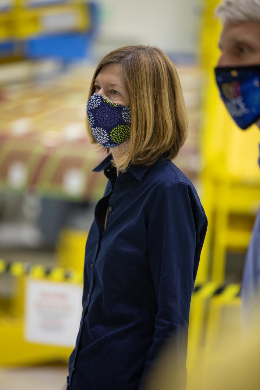 Kathy Lueders, associate administrator of NASA’s Human Exploration and Operations Mission Directorate, visits the Neil Armstrong Operations and Checkout (O&C) Building high bay at the agency’s Kennedy Space Center in Florida on Nov. 5, 2020. While at the O&C, Lueders and senior managers of Orion and Lockheed Martin had the opportunity to view the Artemis I and II spacecraft. In the background is the heat shield for Artemis II. The first in a series of increasingly complex missions, Artemis I will test the Space Launch System rocket and Orion spacecraft as an integrated system prior to crewed flights to the Moon. Under the Artemis program, NASA is planning to land the first woman and the next man on the lunar surface by 2024.