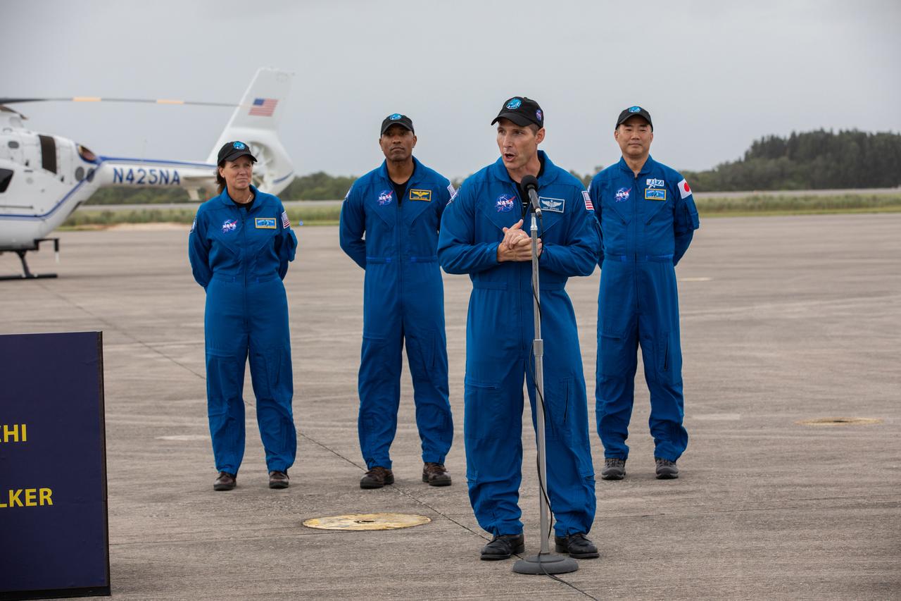 A crew arrival media event for NASA’s SpaceX Crew-1 mission is held Nov. 8, 2020, at the Launch and Landing Facility at the agency’s Kennedy Space Center in Florida. Speaking to the media is NASA astronaut Michael Hopkins, spacecraft commander. Behind him are NASA astronaut Shannon Walker, mission specialist; NASA astronaut Victor Glover, pilot; and JAXA astronaut Soichi Noguchi, mission specialist. Crew-1 is the first crew rotation mission of a U.S. commercial spacecraft with astronauts to the International Space Station as part of NASA’s Commercial Crew Program. The SpaceX Crew Dragon spacecraft, named Resilience, will launch atop a Falcon 9 rocket from Kennedy’s Launch Complex 39A.