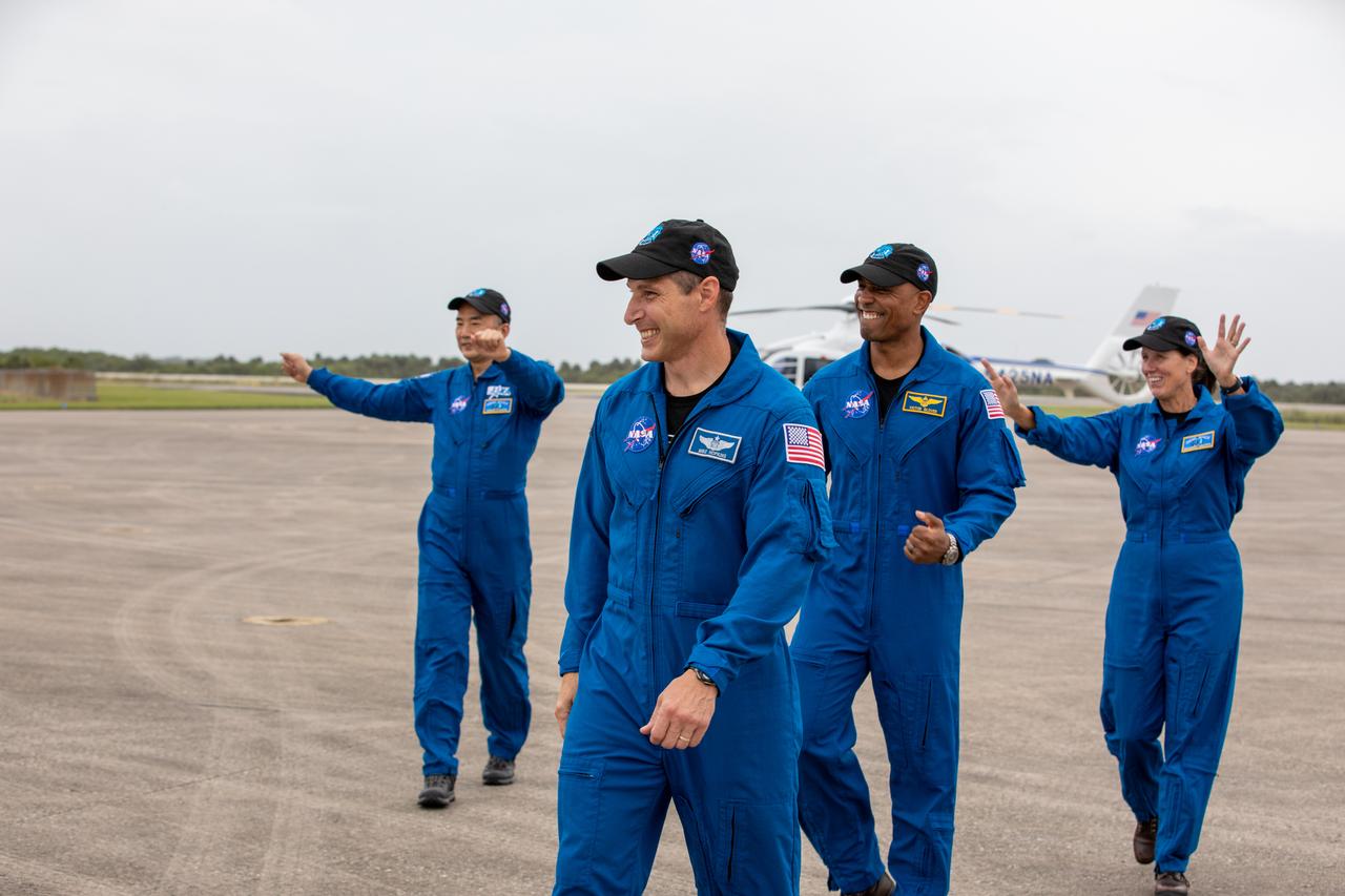 The astronauts for NASA’s SpaceX Crew-1 mission arrive at the Launch and Landing Facility at the agency’s Kennedy Space Center in Florida for a media event on Nov. 8, 2020. From left are, JAXA astronaut Soichi Noguchi, mission specialist; NASA astronaut Michael Hopkins, spacecraft commander; NASA astronaut Victor Glover, pilot; and NASA astronaut Shannon Walker, mission specialist. Crew-1 is the first crew rotation mission of a U.S. commercial spacecraft with astronauts to the International Space Station as part of NASA’s Commercial Crew Program. The SpaceX Crew Dragon spacecraft, named Resilience, will launch atop a Falcon 9 rocket from Kennedy’s Launch Complex 39A.
