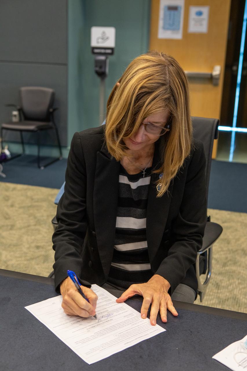 Kathy Lueders, NASA associate administrator of the Human Exploration and Operations Mission Directorate, signs the Human Rating Certification Plan for SpaceX’s crew transportation system, officially certifying the first commercial spacecraft system in history capable of transporting humans to and from the International Space Station as part of the agency’s Commercial Crew Program. The signing occurred during the Flight Readiness Review (FRR) for the agency’s SpaceX Crew-1 mission at NASA’s Kennedy Space Center in Florida on Nov. 10, 2020. The FRR focuses on the preparedness of SpaceX’s crew transportation system, the International Space Station, and its international partners to support the flight, and the certification of flight readiness. Crew-1 is the first regular crew mission of a U.S. commercial spacecraft with astronauts to the International Space Station as part of NASA’s Commercial Crew Program. The Crew Dragon Resilience capsule will launch atop a Falcon 9 rocket from Launch Complex 39A carrying NASA astronauts Michael Hopkins, Victor Glover, Shannon Walker and Japan Aerospace Exploration Agency (JAXA) astronaut Soichi Noguchi to the space station for a six-month science mission.
