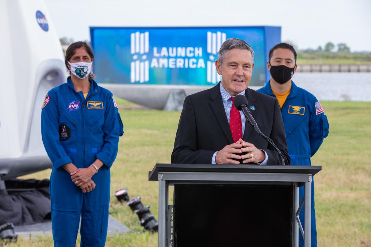 Kennedy Space Center Director Bob Cabana speaks during a press briefing Nov. 13, 2020, near the Press Site countdown clock at the agency’s Kennedy Space Center in Florida ahead of NASA’s SpaceX Crew-1 launch. Behind him are NASA astronaut Sunita Williams, at left, and NASA astronaut Jonny Kim. Crew-1 is the first regular crew mission of a U.S. commercial spacecraft with astronauts to the International Space Station as part of NASA’s Commercial Crew Program. The SpaceX Crew Dragon Resilience capsule will launch atop the company’s Falcon 9 rocket from Launch Complex 39A to the space station for a six-month science mission.