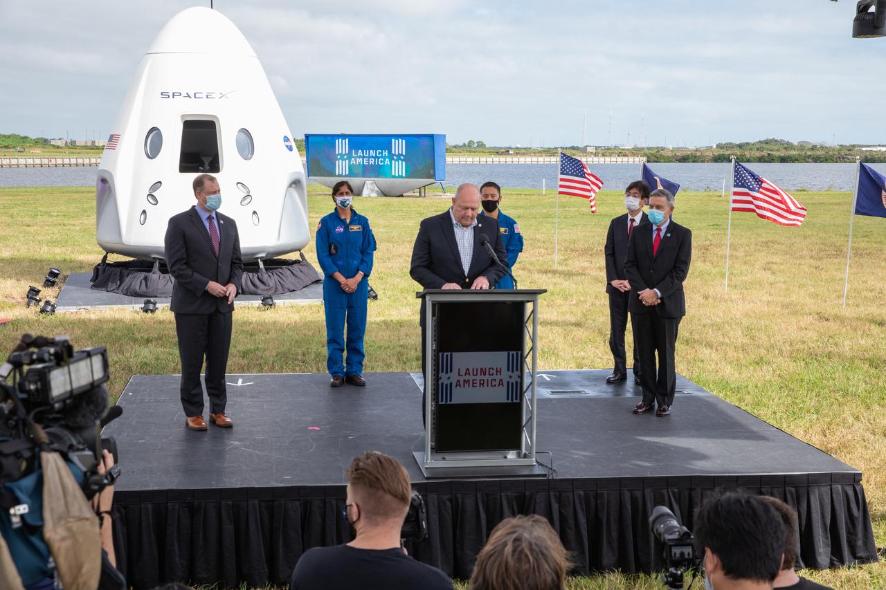 Steve Dickson, administrator, Federal Aviation Administration, speaks during a press briefing Nov. 13, 2020, near the Press Site countdown clock at the agency’s Kennedy Space Center in Florida ahead of NASA’s SpaceX Crew-1 launch. Behind him, from left are NASA Administrator Jim Bridenstine, NASA astronaut Sunita Williams, NASA astronaut Jonny Kim, Hiroshi Sasaki, vice president and director general, JAXA’s Human Spaceflight, and Kennedy Space Center Director Bob Cabana. Crew-1 is the first regular crew mission of a U.S. commercial spacecraft with astronauts to the International Space Station as part of NASA’s Commercial Crew Program. The SpaceX Crew Dragon Resilience capsule will launch atop the company’s Falcon 9 rocket from Launch Complex 39A to the space station for a six-month science mission.