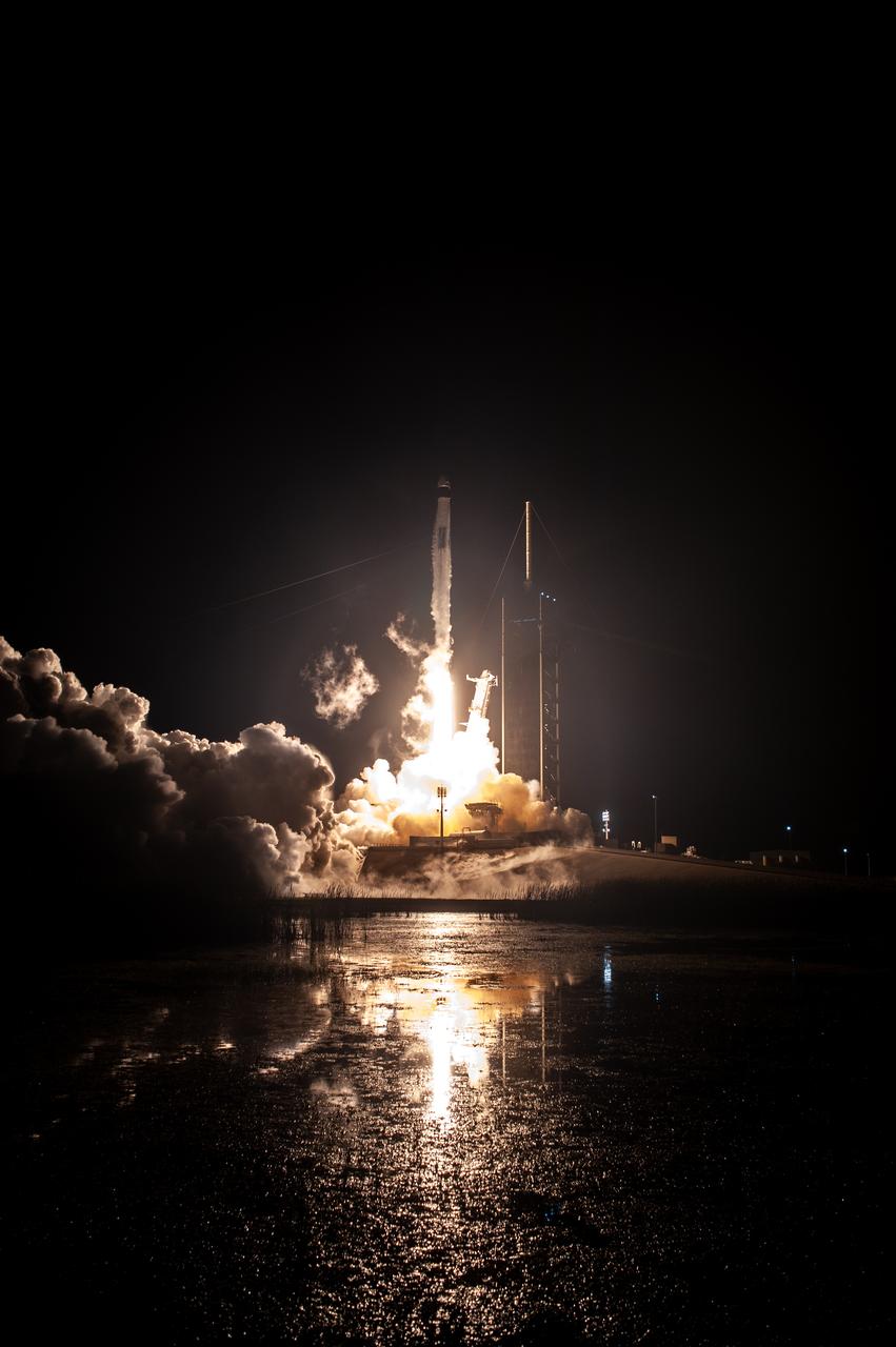 A SpaceX Falcon 9 rocket lifts off at 7:27 p.m. EST from Launch Complex 39A at NASA’s Kennedy Space Center in Florida on Nov. 15, 2020, carrying the company’s Crew Dragon Resilience capsule. Onboard the capsule are NASA’s SpaceX Crew-1 NASA astronauts, Michael Hopkins, spacecraft commander; Victor Glover, pilot; Shannon Walker, mission specialist; and Japan Aerospace Exploration Agency astronaut Soichi Noguchi, mission specialist. Crew-1 is the first regular crew mission of a U.S. commercial spacecraft with astronauts to the International Space Station as part of NASA’s Commercial Crew Program. The Crew Dragon will dock with the space station and the crew will remain on the orbiting laboratory for a six-month science mission.
