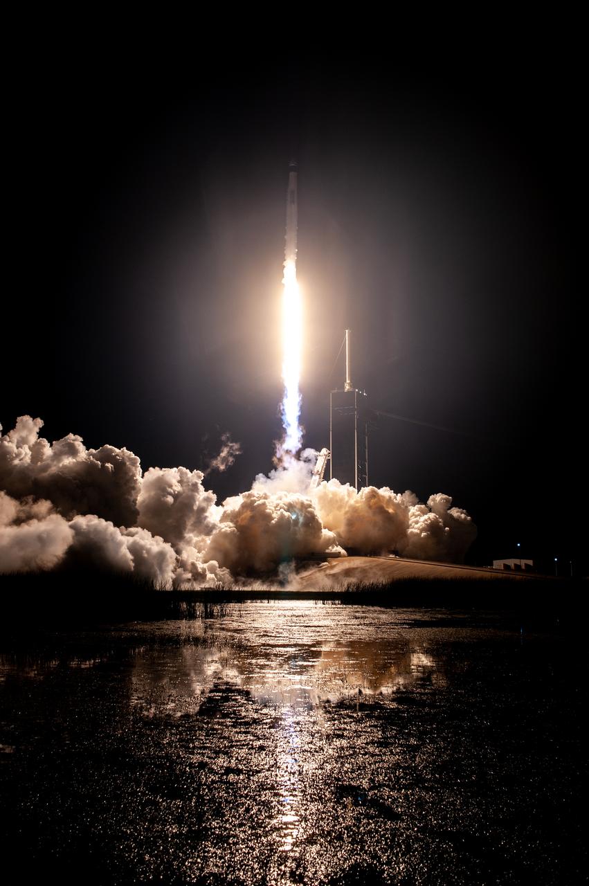 A SpaceX Falcon 9 rocket lifts off at 7:27 p.m. EST from Launch Complex 39A at NASA’s Kennedy Space Center in Florida on Nov. 15, 2020, carrying the company’s Crew Dragon Resilience capsule. Onboard the capsule are NASA’s SpaceX Crew-1 NASA astronauts, Michael Hopkins, spacecraft commander; Victor Glover, pilot; Shannon Walker, mission specialist; and Japan Aerospace Exploration Agency astronaut Soichi Noguchi, mission specialist. Crew-1 is the first regular crew mission of a U.S. commercial spacecraft with astronauts to the International Space Station as part of NASA’s Commercial Crew Program. The Crew Dragon will dock with the space station and the crew will remain on the orbiting laboratory for a six-month science mission. 