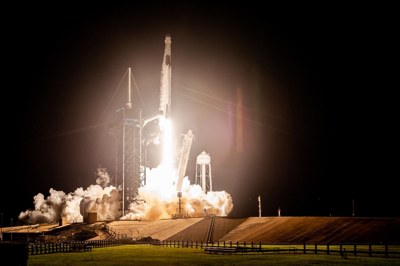 A SpaceX Falcon 9 rocket lifts off at 7:27 p.m. EST from Launch Complex 39A at NASA’s Kennedy Space Center in Florida on Nov. 15, 2020, carrying the company’s Crew Dragon Resilience capsule. Onboard the capsule are NASA’s SpaceX Crew-1 NASA astronauts, Michael Hopkins, spacecraft commander; Victor Glover, pilot; Shannon Walker, mission specialist; and Japan Aerospace Exploration Agency astronaut Soichi Noguchi, mission specialist. Crew-1 is the first regular crew mission of a U.S. commercial spacecraft with astronauts to the International Space Station as part of NASA’s Commercial Crew Program. The Crew Dragon will dock with the space station and the crew will remain on the orbiting laboratory for a six-month science mission.