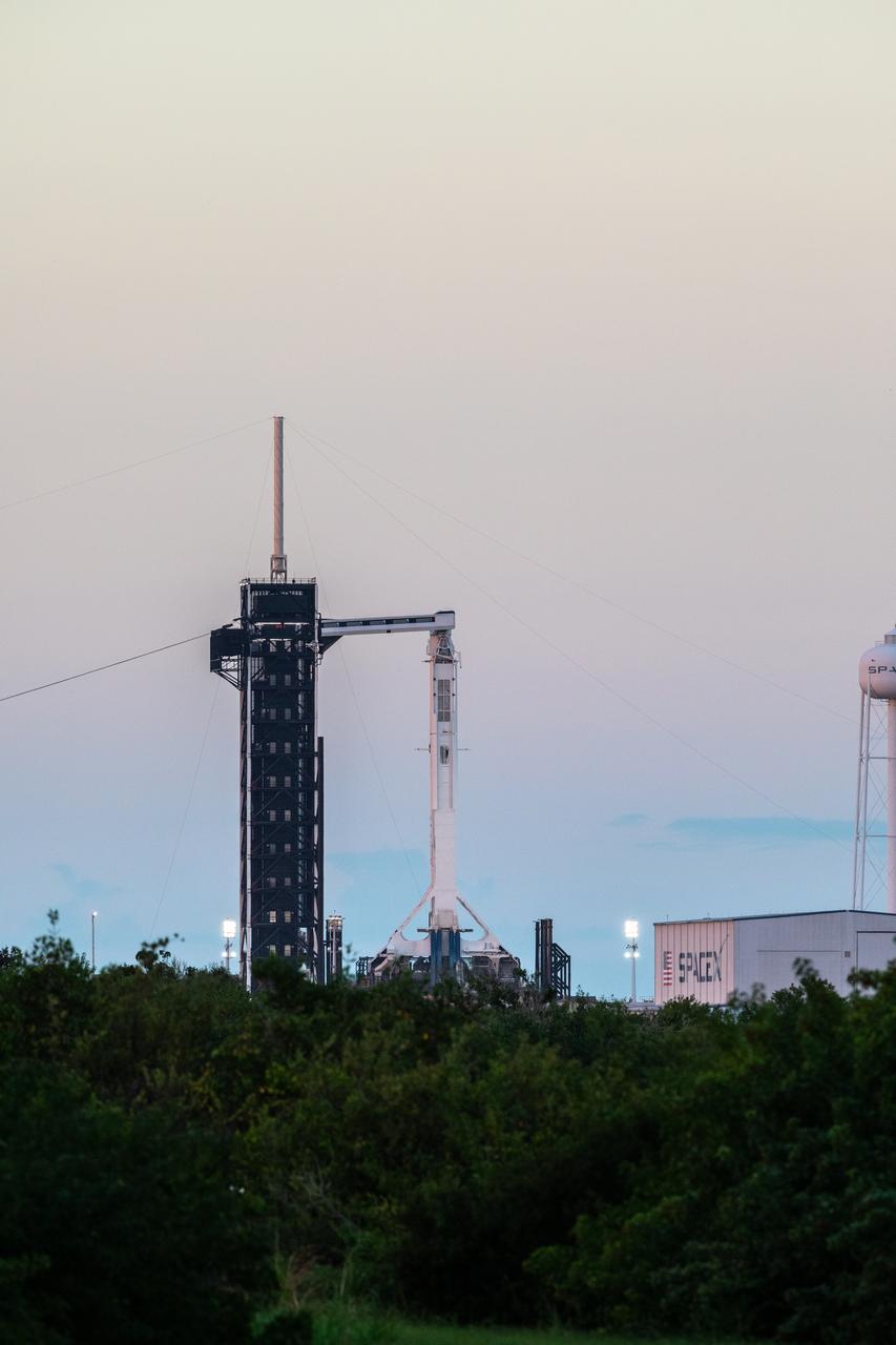 A SpaceX Falcon 9 rocket sits on Launch Pad 39A at NASA’s Kennedy Space Center in Florida on Nov. 15, 2020, ready for launch. The Crew Dragon Resilience capsule sits atop with NASA’s SpaceX Crew-1 NASA astronauts, Michael Hopkins, spacecraft commander; Victor Glover, pilot; Shannon Walker, mission specialist; and Japan Aerospace Exploration Agency astronaut Soichi Noguchi, mission specialist. Crew-1 is the first regular crew mission of a U.S. commercial spacecraft with astronauts to the International Space Station as part of NASA’s Commercial Crew Program. The Crew Dragon will dock with the space station and the crew will remain on the orbiting laboratory for a six-month science mission.