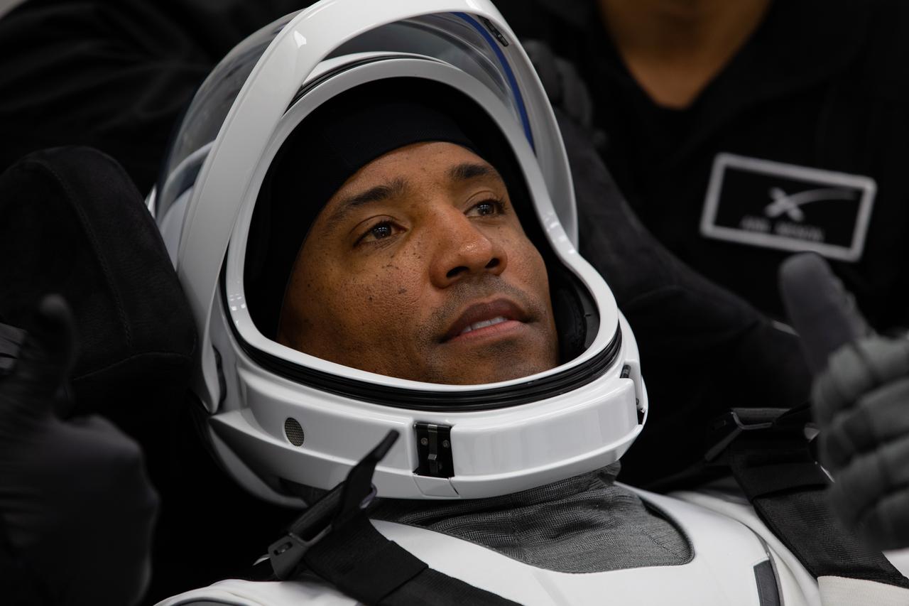 Inside the crew suit-up room in the Neil Armstrong Operations and Checkout Building at NASA’s Kennedy Space Center in Florida, on Nov. 15, 2020, NASA astronaut Victor Glover, pilot, dons a SpaceX spacesuit in preparation for NASA SpaceX’s Crew-1 mission. Crew-1 is the first regular crew mission of a U.S. commercial spacecraft with astronauts to the International Space Station as part of NASA’s Commercial Crew Program. The SpaceX Crew Dragon Resilience capsule will launch atop the company’s Falcon 9 rocket from Launch Complex 39A to the space station for a six-month science mission.