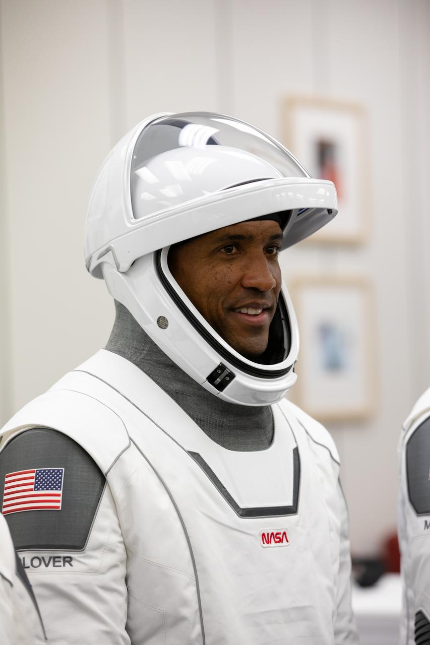 Inside the crew suit-up room in the Neil Armstrong Operations and Checkout Building at NASA’s Kennedy Space Center in Florida, on Nov. 15, 2020, NASA astronaut Victor Glover, pilot, is shown in a SpaceX spacesuit in preparation for NASA SpaceX’s Crew-1 mission. Crew-1 is the first regular crew mission of a U.S. commercial spacecraft with astronauts to the International Space Station as part of NASA’s Commercial Crew Program. The SpaceX Crew Dragon Resilience capsule will launch atop the company’s Falcon 9 rocket from Launch Complex 39A to the space station for a six-month science mission.