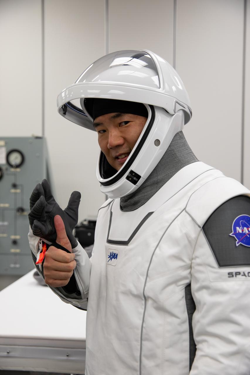 Inside the crew suit-up room in the Neil Armstrong Operations and Checkout Building at NASA’s Kennedy Space Center in Florida, on Nov. 15, 2020, Japan Aerospace Exploration Agency (JAXA) astronaut Soichi Noguchi, mission specialist, is shown in a SpaceX spacesuit in preparation for NASA SpaceX’s Crew-1 mission. Crew-1 is the first regular crew mission of a U.S. commercial spacecraft with astronauts to the International Space Station as part of NASA’s Commercial Crew Program. The SpaceX Crew Dragon Resilience capsule will launch atop the company’s Falcon 9 rocket from Launch Complex 39A to the space station for a six-month science mission.