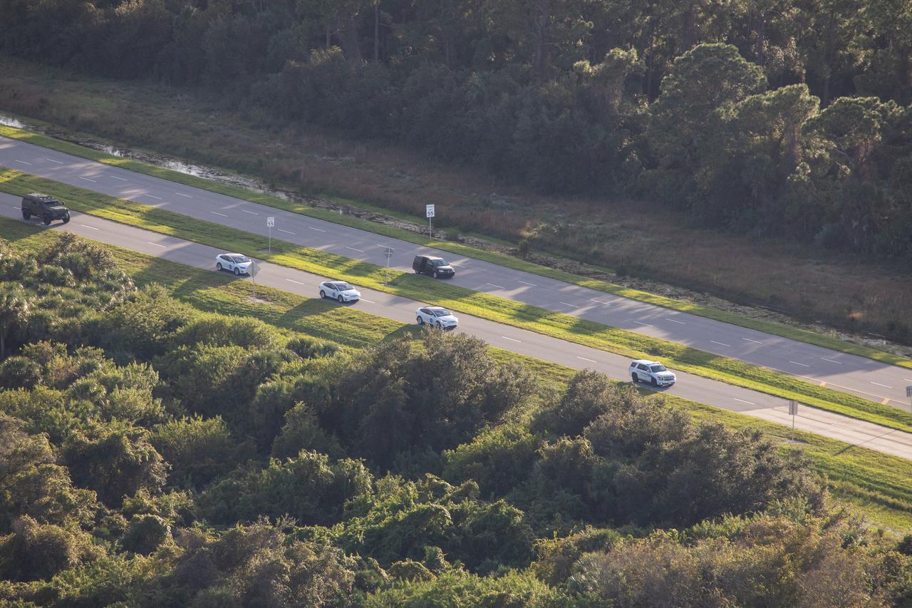 Two Tesla vehicles carrying the NASA SpaceX Crew-1 astronauts are on their way to Launch Complex 39A on Nov. 15, 2020, at NASA’s Kennedy Space Center in Florida. Inside the vehicles are NASA astronaut Michael Hopkins, spacecraft commander; NASA astronaut Victor Glover, pilot; NASA astronaut Shannon Walker, mission specialist; and Japan Aerospace Exploration Agency astronaut Soichi Noguchi, mission specialist. Crew-1 is the first regular crew mission of a U.S. commercial spacecraft with astronauts to the International Space Station as part of NASA’s Commercial Crew Program. The SpaceX Crew Dragon Resilience capsule will launch atop the company’s Falcon 9 rocket from Pad 39A to the space station for a six-month science mission.