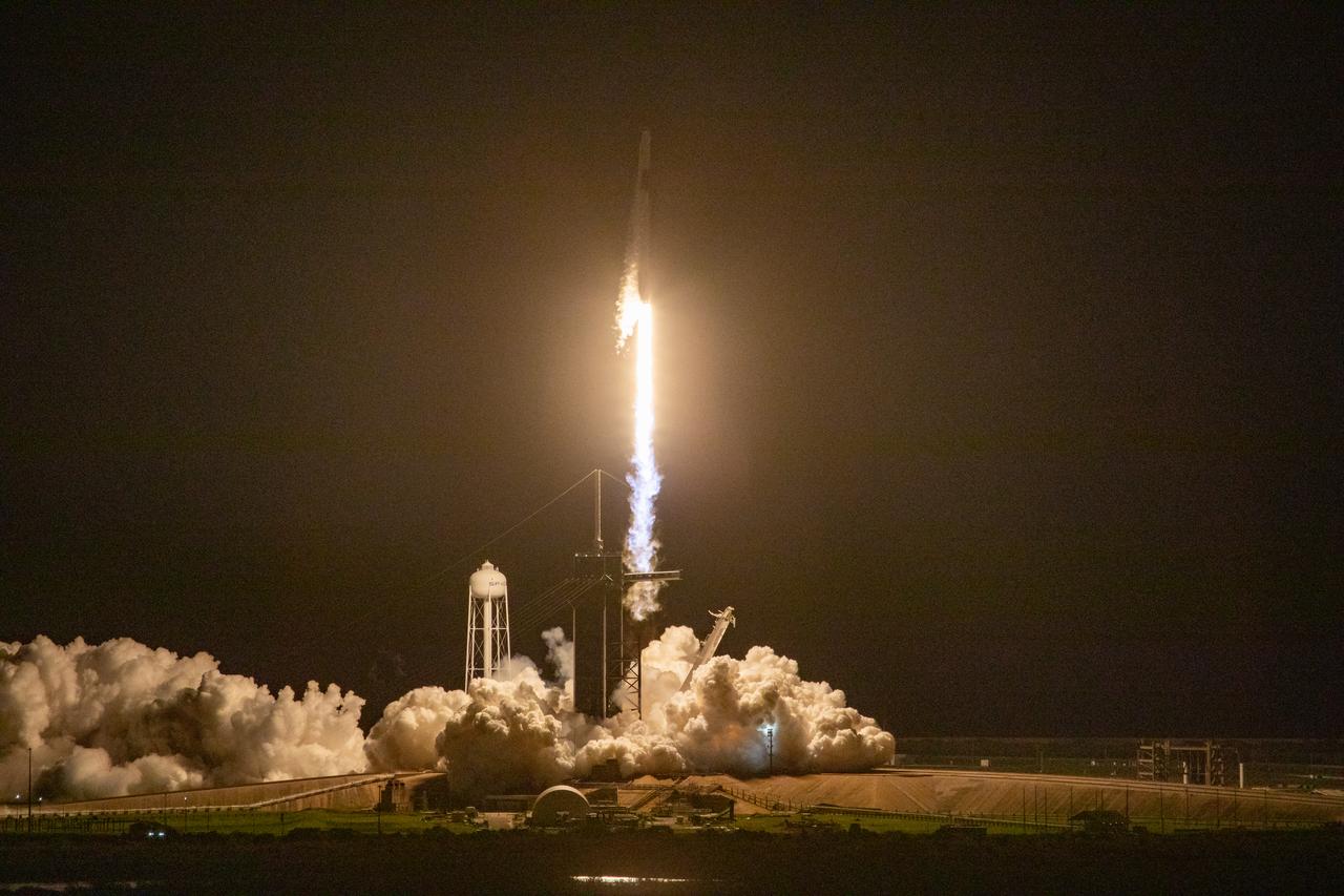 A SpaceX Falcon 9 rocket lifts off at 7:27 p.m. EST from Launch Complex 39A at NASA’s Kennedy Space Center in Florida on Nov. 15, 2020, carrying the company’s Crew Dragon Resilience capsule. Onboard the capsule are NASA’s SpaceX Crew-1 NASA astronauts, Michael Hopkins, spacecraft commander; Victor Glover, pilot; Shannon Walker, mission specialist; and Japan Aerospace Exploration Agency astronaut Soichi Noguchi, mission specialist. Crew-1 is the first regular crew mission of a U.S. commercial spacecraft with astronauts to the International Space Station as part of NASA’s Commercial Crew Program. The Crew Dragon will dock with the space station and the crew will remain on the orbiting laboratory for a six-month science mission.