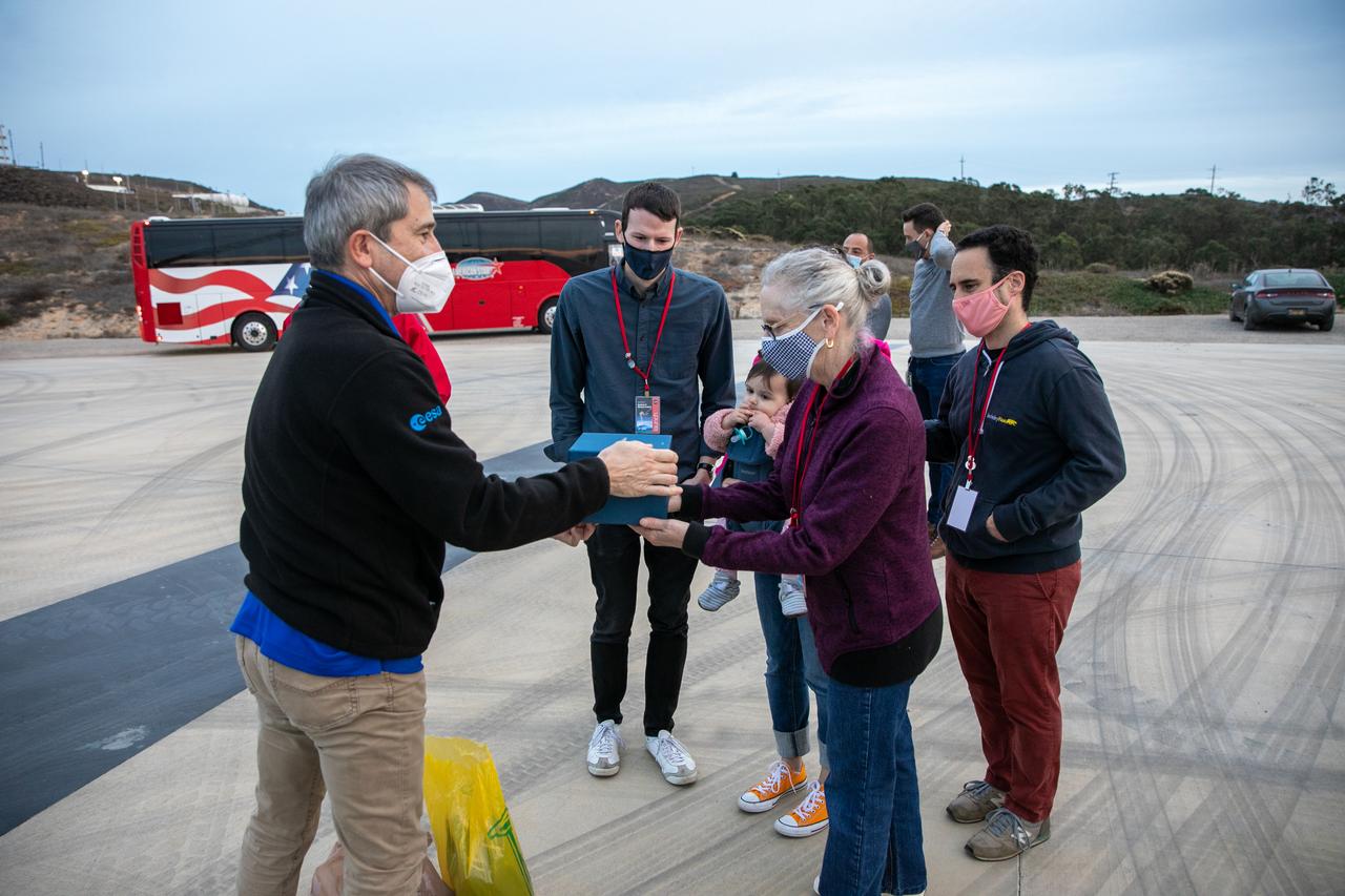 European Space Agency’s Copernicus Space Segment Programme Manager Guido Levrini, left, greets Dr. Michael Freilich’s wife, Shoshannah, at Vandenberg Air Force Base in California on Nov. 20, 2020, the day before the spacecraft’s planned launch atop a Falcon 9 rocket. Seen in the background between them is Freilich’s son, Daniel, and to his right is Freilich’s daughter, Sarah. Michael Freilich, for whom the Sentinel-6 Michael Freilich satellite is named, served as director of NASA’s Earth Science Division in the Science Mission Directorate at the agency’s Headquarters from 2006 until his retirement in 2019. A tireless advocate for advancing satellite measurements of the ocean, he was instrumental in advancing ocean altimetry and helped drive the evolution of NASA Earth science from a program that launched an Earth-observing space mission every few years to one that launches several missions each year. Freilich died Aug. 5, 2020, of pancreatic cancer. Sentinel-6 Michael Freilich launched Nov. 21, 2020, at 9:17 a.m. PST (12:17 p.m. EST). NASA’s Launch Services Program at Kennedy Space Center was responsible for launch management.