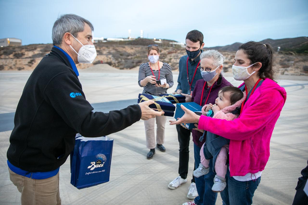 European Space Agency’s Copernicus Space Segment Programme Manager Guido Levrini, left, greets Dr. Michael Freilich’s daughter, Sarah, at Vandenberg Air Force Base in California on Nov. 20, 2020, the day before the spacecraft’s planned launch atop a Falcon 9 rocket. Standing next to her is her mother, Shoshannah, and brother, Daniel. Michael Freilich, for whom the Sentinel-6 Michael Freilich satellite is named, served as director of NASA’s Earth Science Division in the Science Mission Directorate at the agency’s Headquarters from 2006 until his retirement in 2019. A tireless advocate for advancing satellite measurements of the ocean, he was instrumental in advancing ocean altimetry and helped drive the evolution of NASA Earth science from a program that launched an Earth-observing space mission every few years to one that launches several missions each year. Freilich died Aug. 5, 2020, of pancreatic cancer. Sentinel-6 Michael Freilich launched Nov. 21, 2020, at 9:17 a.m. PST (12:17 p.m. EST). NASA’s Launch Services Program at Kennedy Space Center was responsible for launch management.
