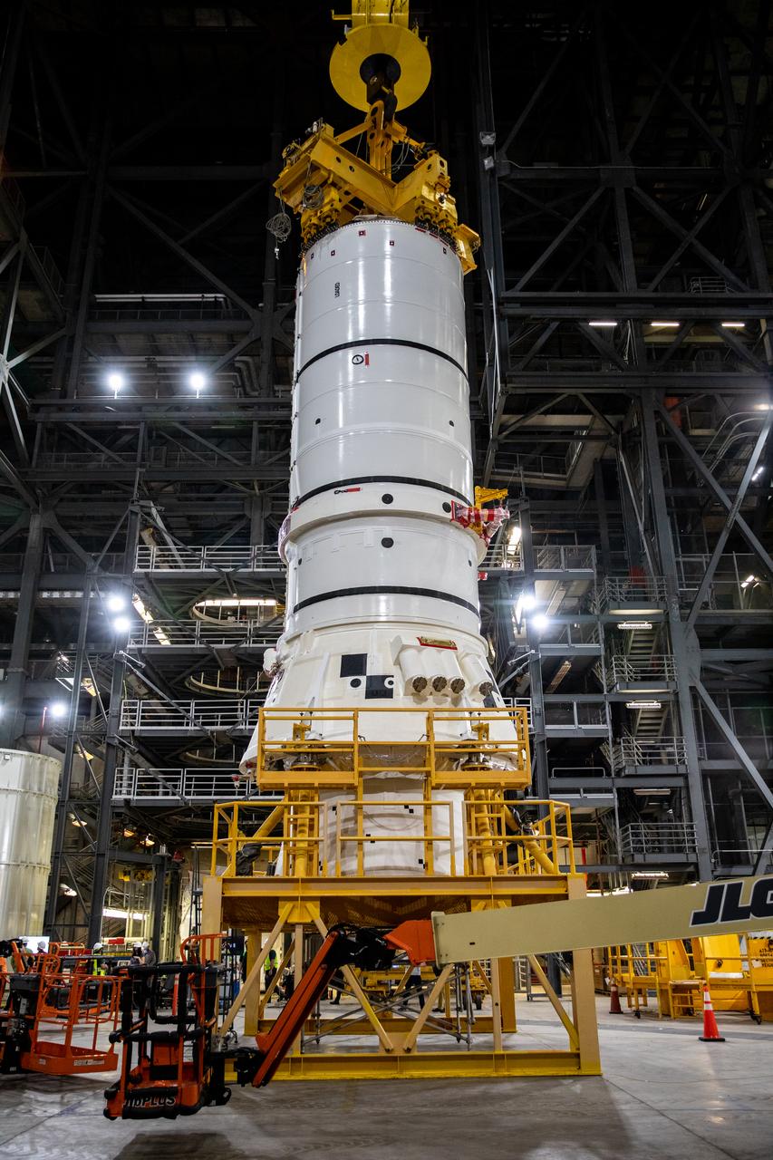 In High Bay 4 of the Vehicle Assembly Building (VAB) at NASA’s Kennedy Space Center in Florida, one of the Artemis I aft booster segments for the Space Launch System is being prepared for stacking operations on Nov. 20, 2020. Workers with Exploration Ground Systems and contractor Jacobs teams will stack the twin five-segment boosters on the mobile launcher in High Bay 3 over a number of weeks. When the core stage arrives, it will join the boosters on the mobile launcher, followed by the interim cryogenic propulsion stage and Orion spacecraft. Manufactured by Northrop Grumman in Utah, the twin boosters provide more than 75 percent of the total SLS thrust at launch. The SLS is managed by Marshall Space Flight Center in Huntsville, Alabama. Under the Artemis program, NASA will land the first woman and the next man on the Moon by 2024. The first in a series of increasingly complex missions, Artemis I will test the Orion spacecraft and SLS as an integrated system ahead of crewed flights to the Moon.